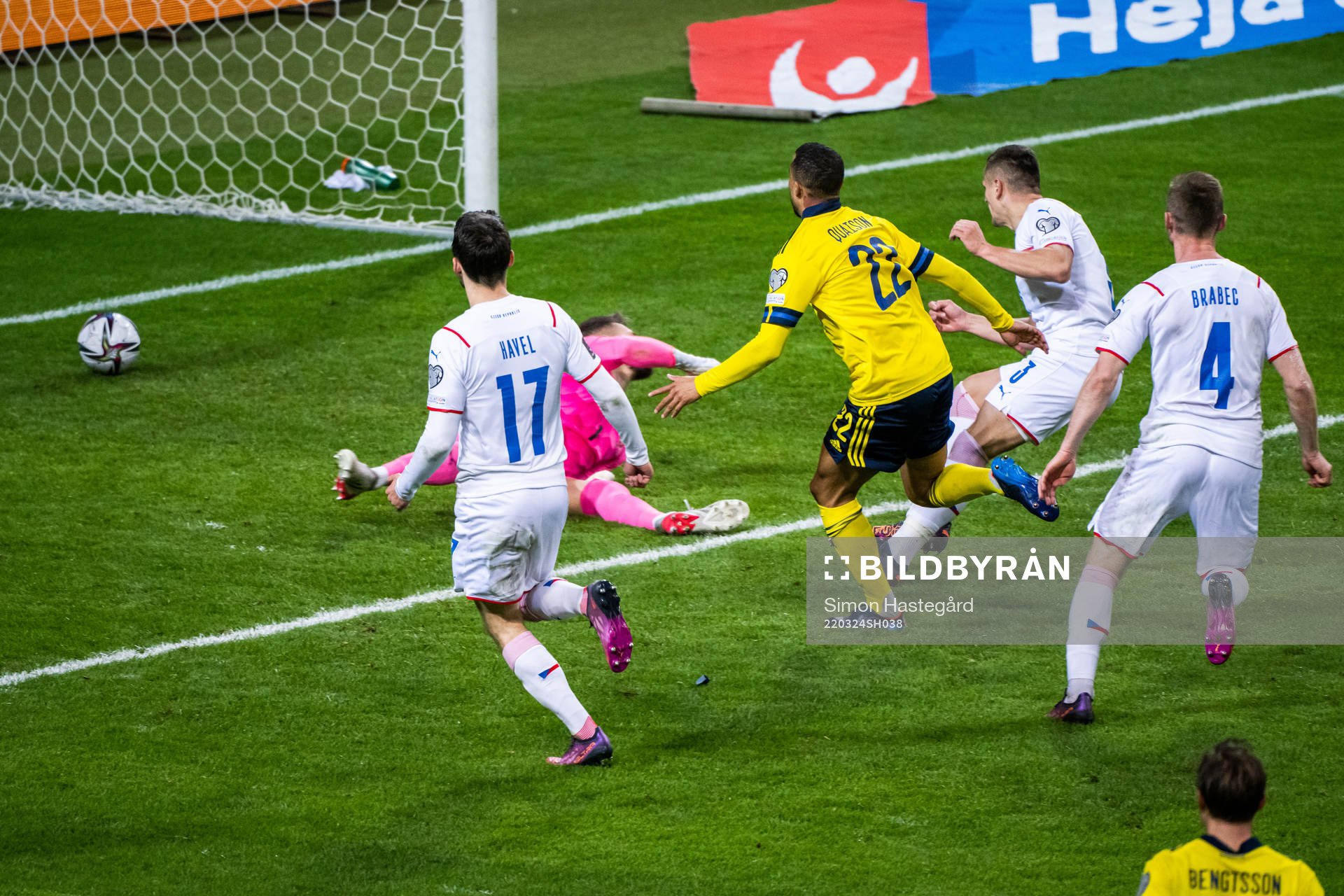 Robin Quaison of Sweden scores 1-0 behind goalkeeper Tomas