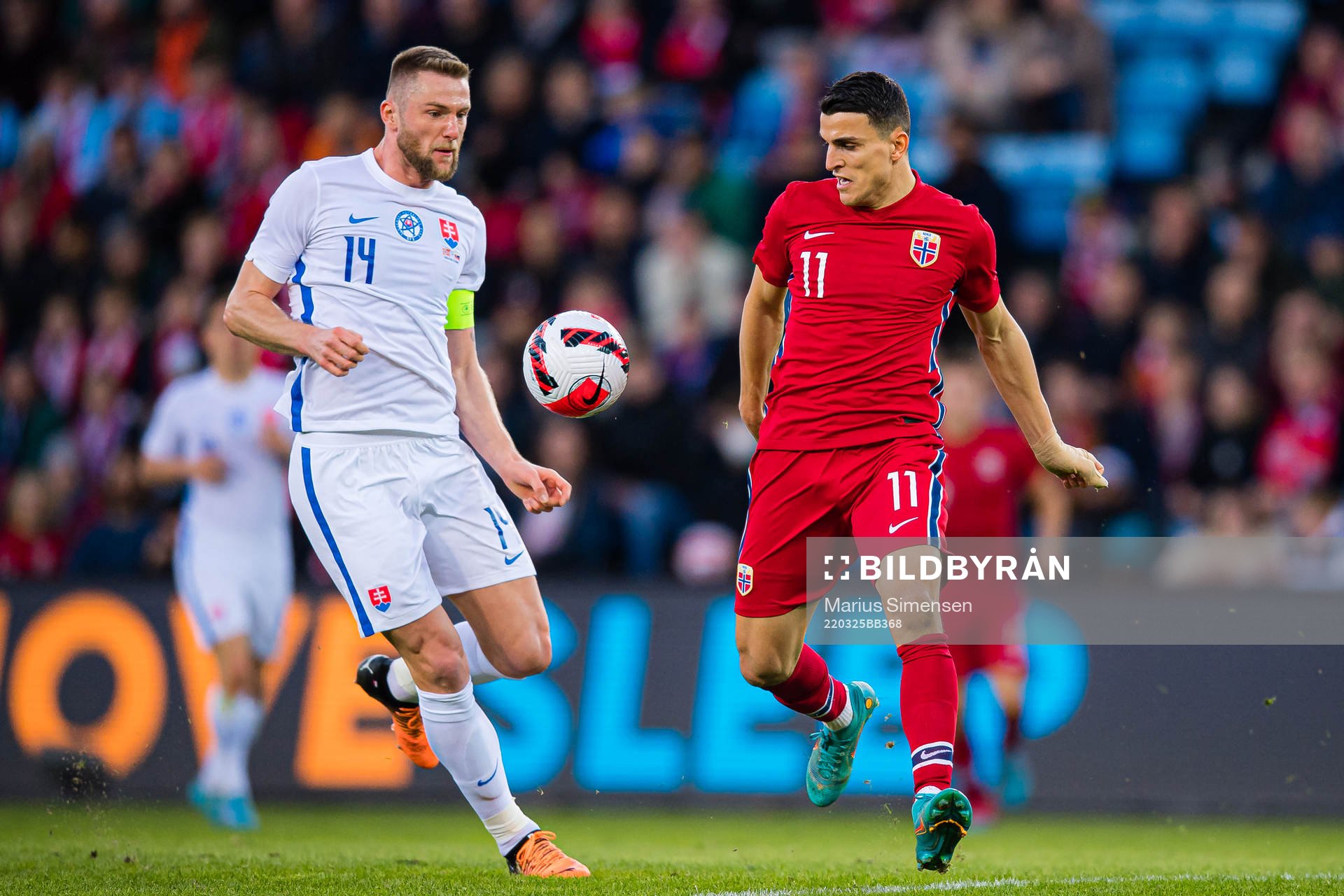 Milan Škriniar of Slovakia and Mohamed Amine Elyounoussi