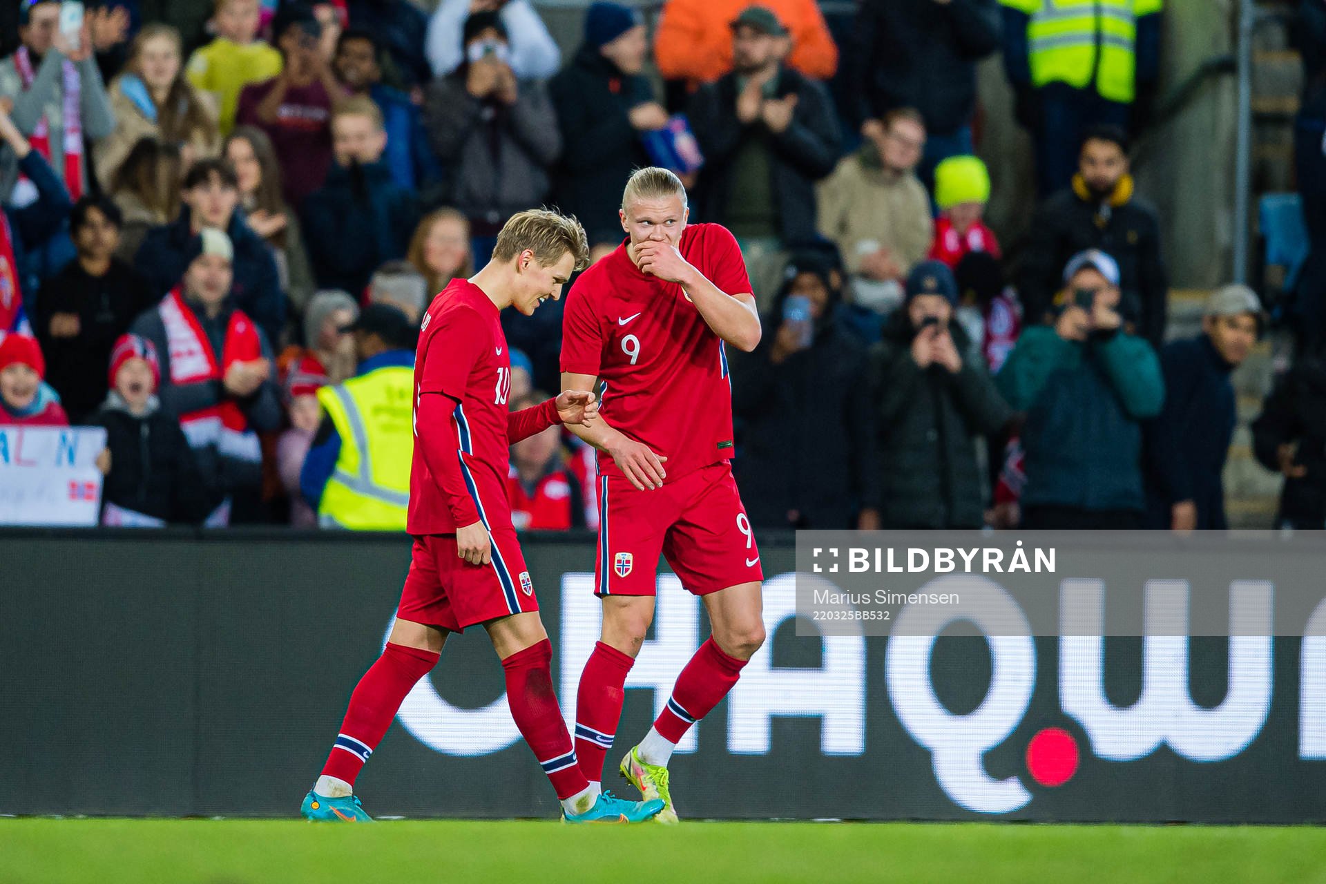 Martin Ødegaard of Norway celebrates with Erling Braut