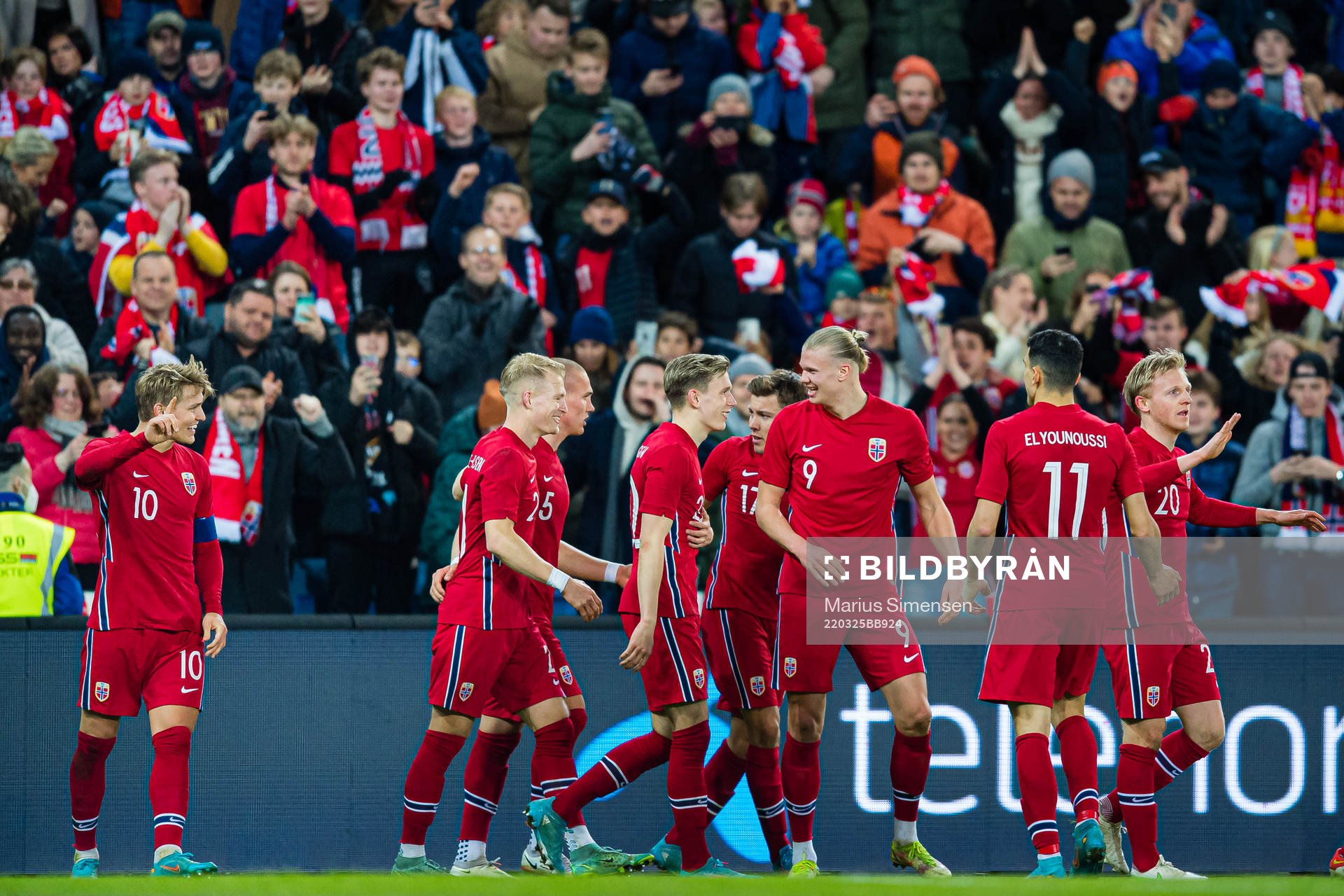 Martin Ødegaard of Norway celebrates with Erling Braut