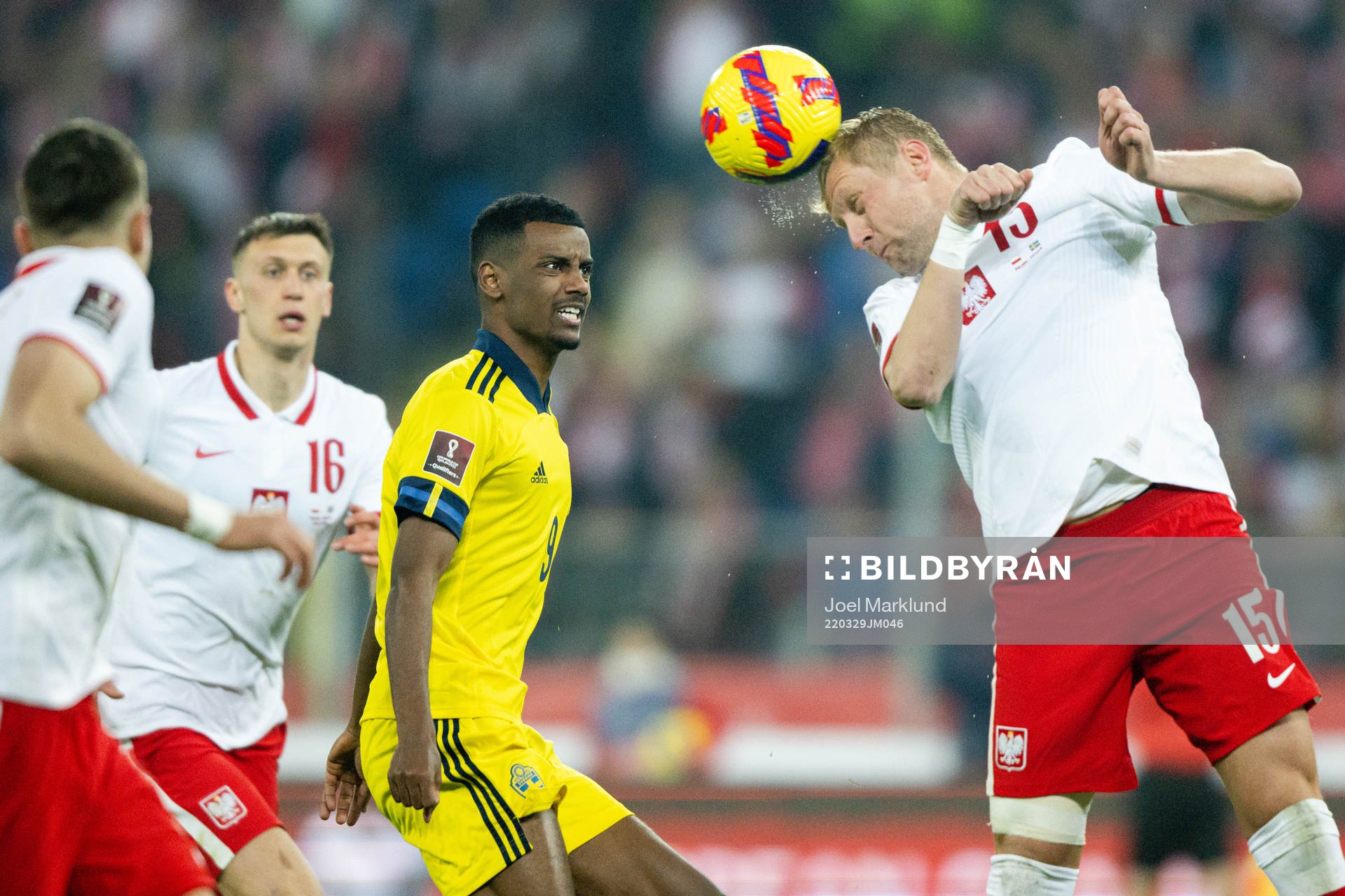 Alexander Isak of Sweden against Kamil Glik of Poland