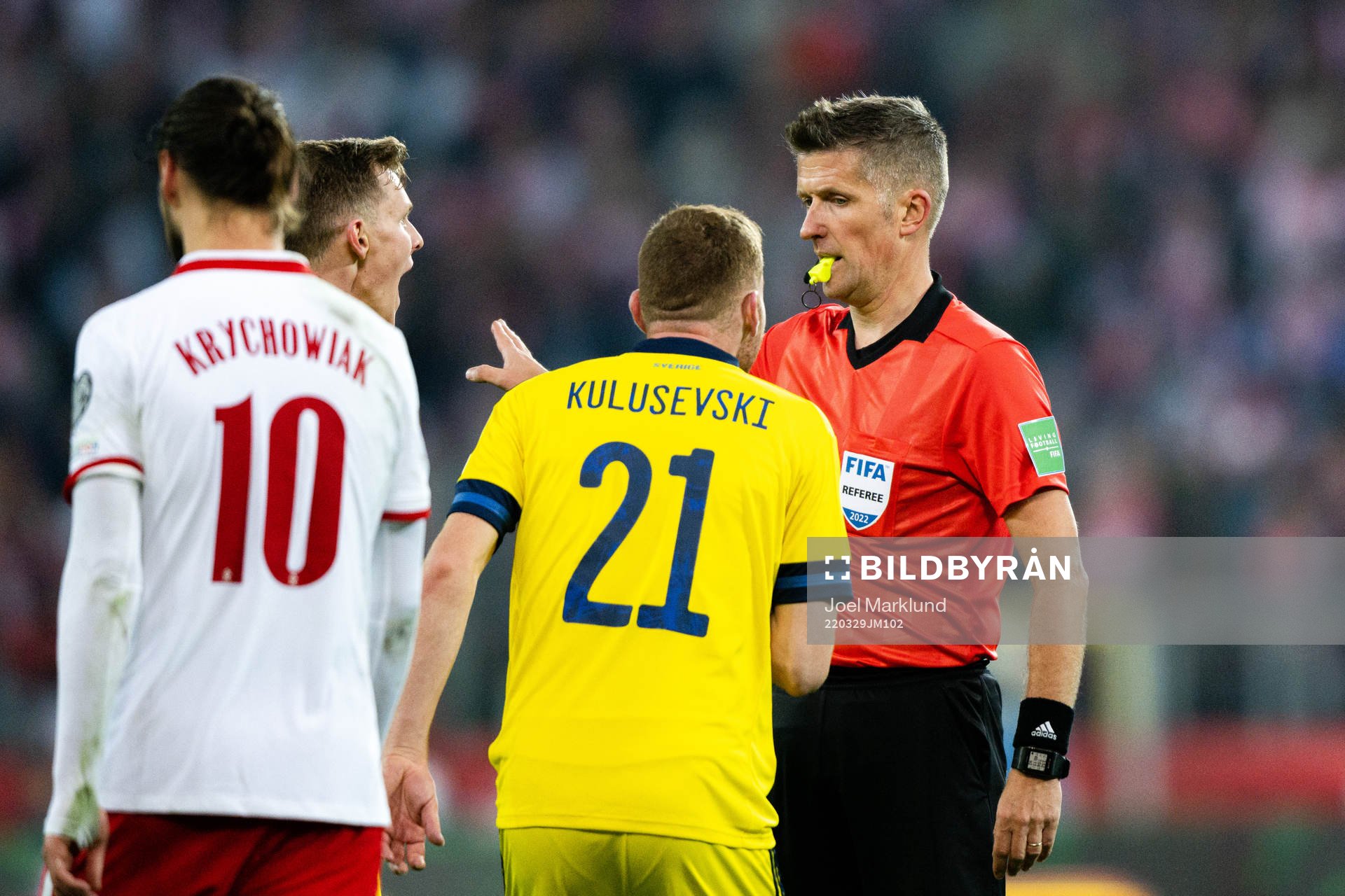 Dejan Kulusevski of Sweden and referee Daniele Orsato