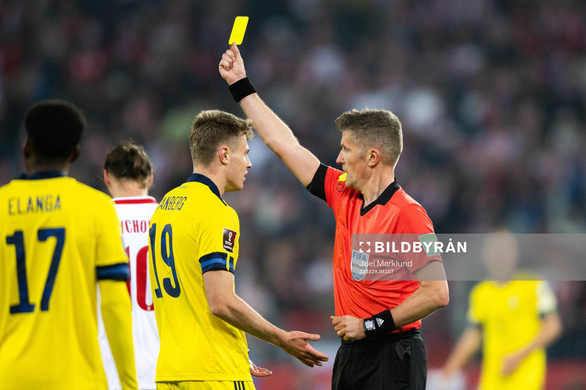 Mattias Svanberg of Sweden and referee Daniele Orsato