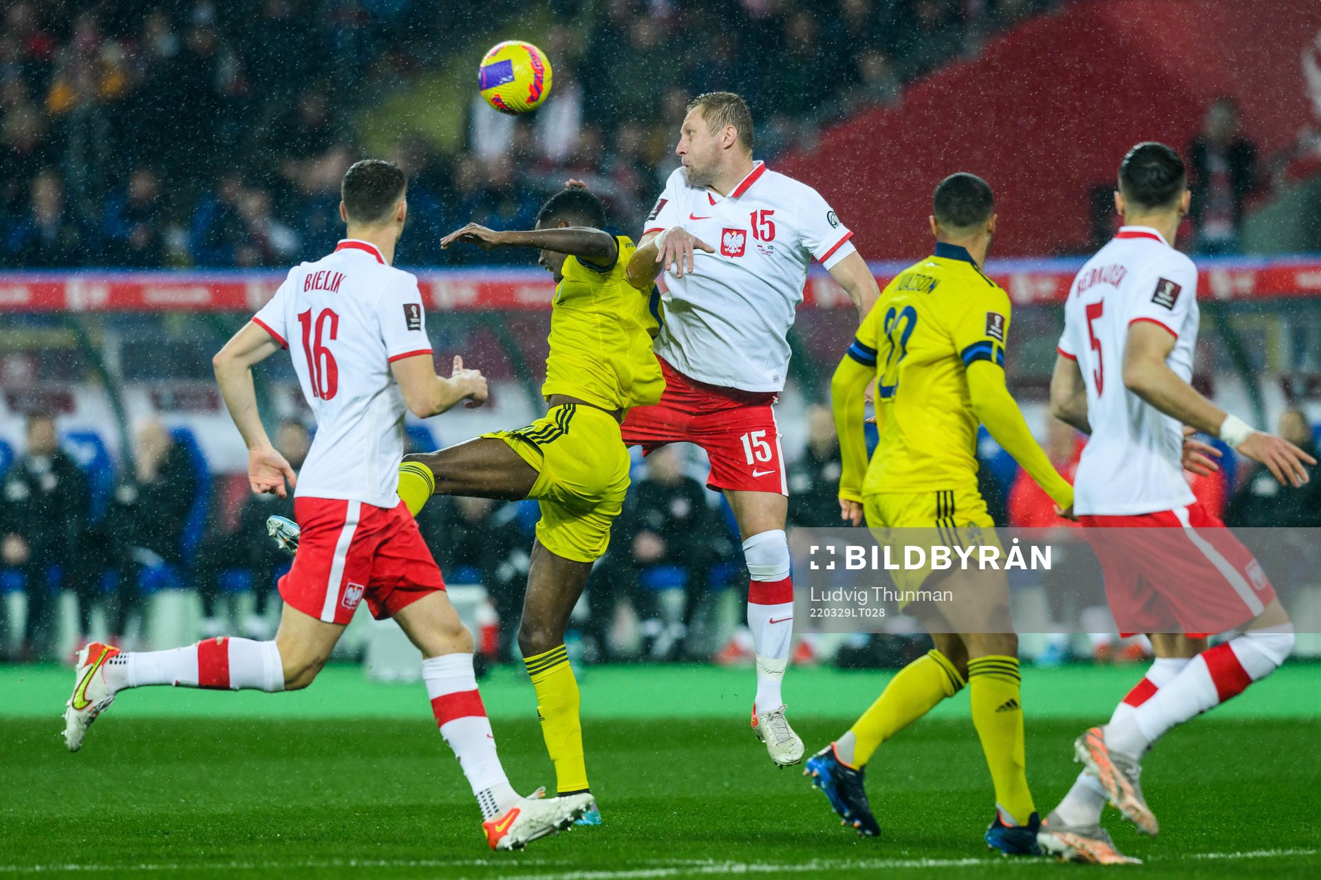 Alexander Isak of Sweden and Kamil Glik of Poland
