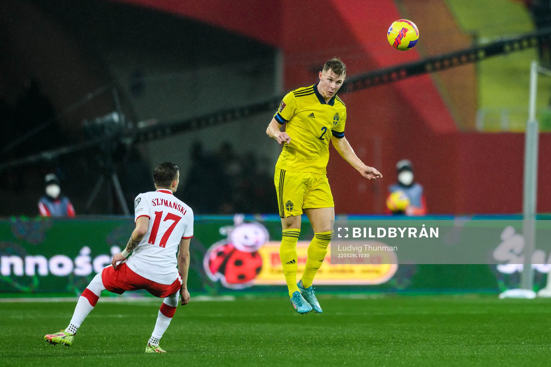 Sebastian Szymanski of Poland and Emil Krafth of Sweden