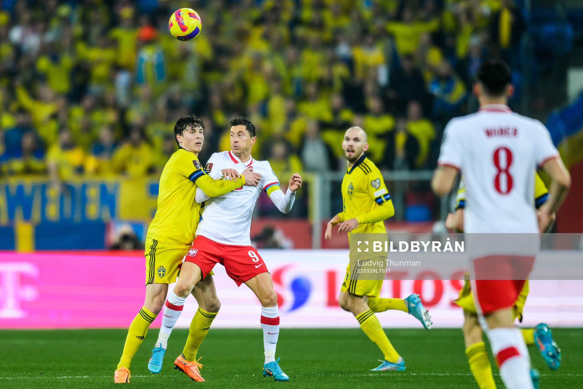 Victor Nilsson Lindelöf of Sweden and Robert Lewandowski