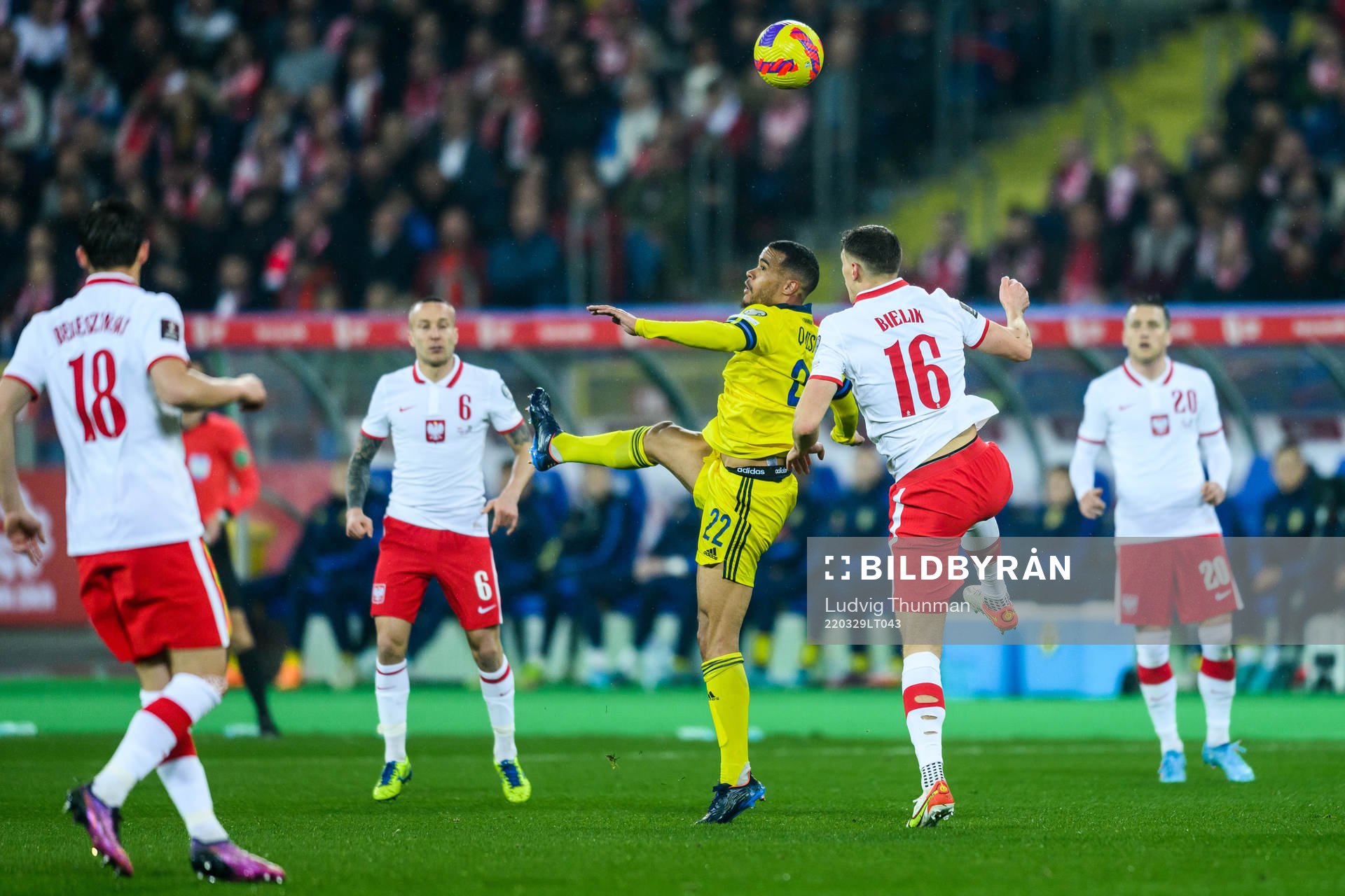 Robin Quaison of Sweden and Krystian Bielik of Poland