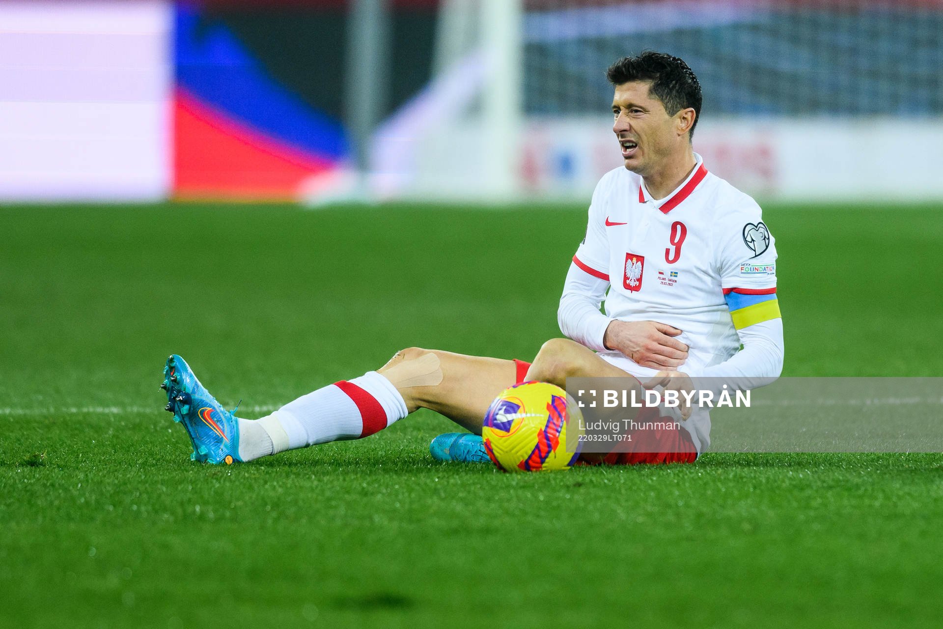 Robert Lewandowski of Poland in pain