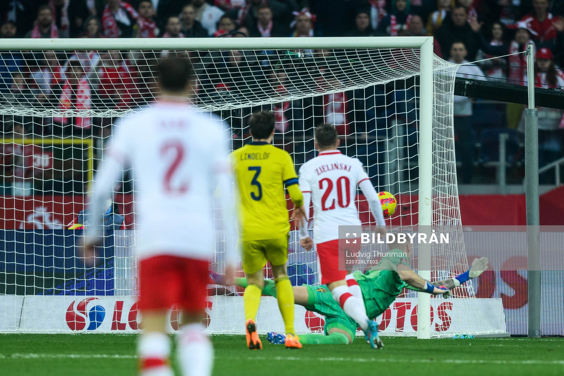 Piotr Zielinski of Poland scores 2-0 against goalkeeper