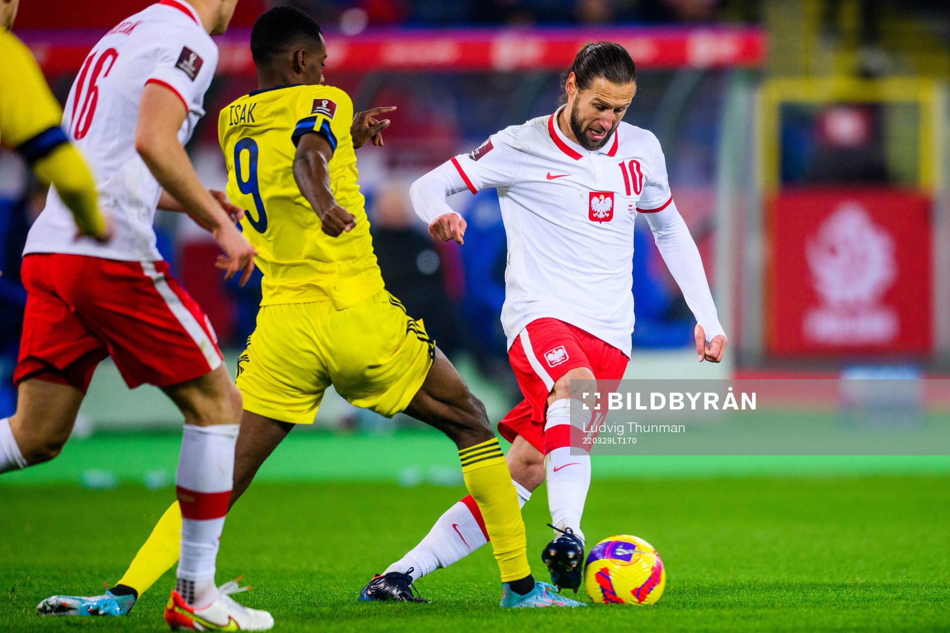 Alexander Isak of Sweden and Grzegorz Krychowiak of Poland during the FIFA World Cup Qualifier play-off final between Poland and Sweden on March 29, 2022 in Katowice.