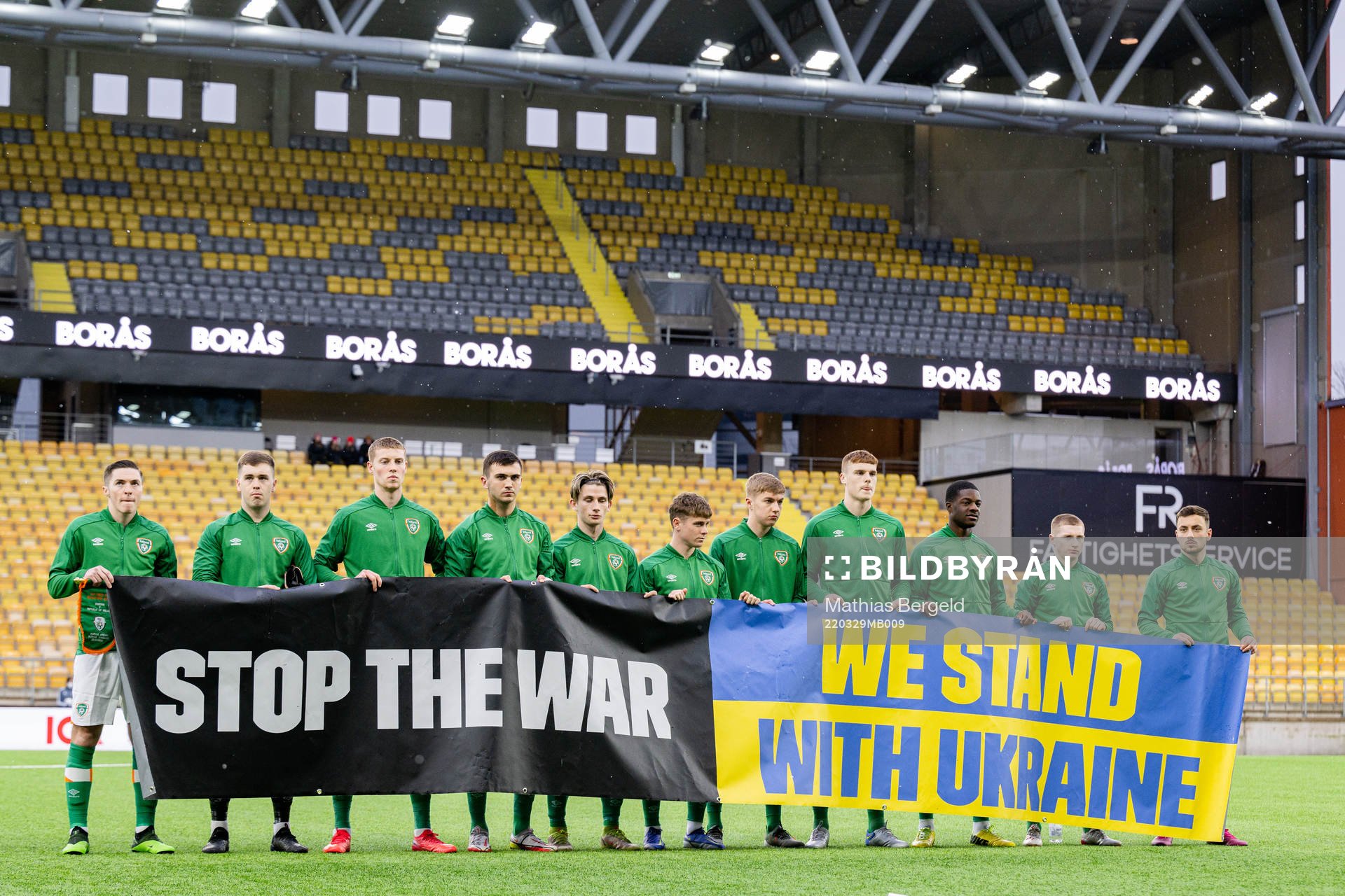 Players of Ireland with a banner