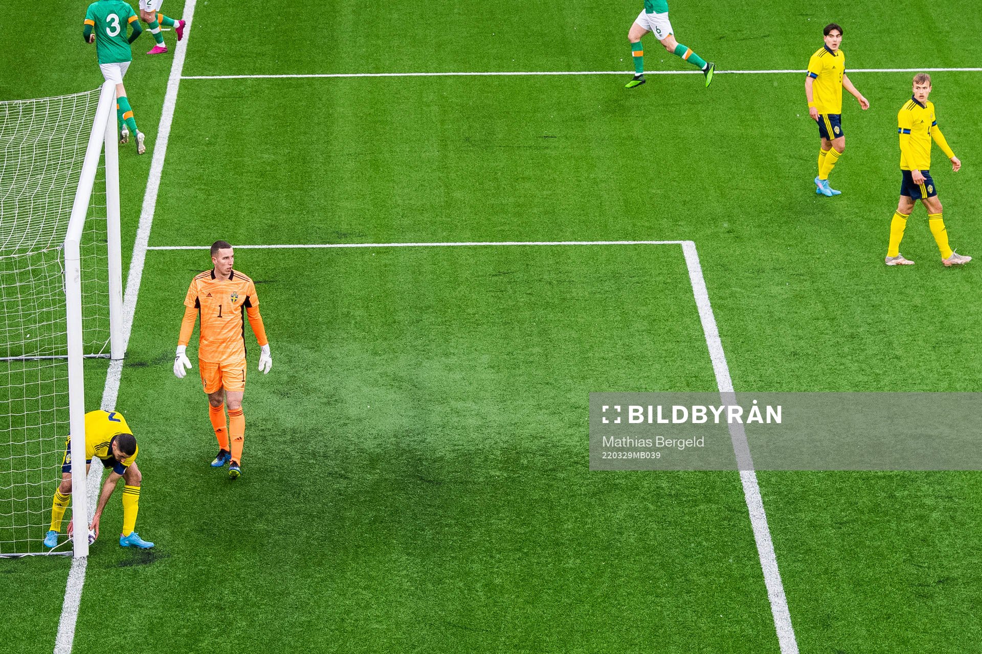 Aiham Ousou and goalkeeper Samuel Brolin of Sweden look