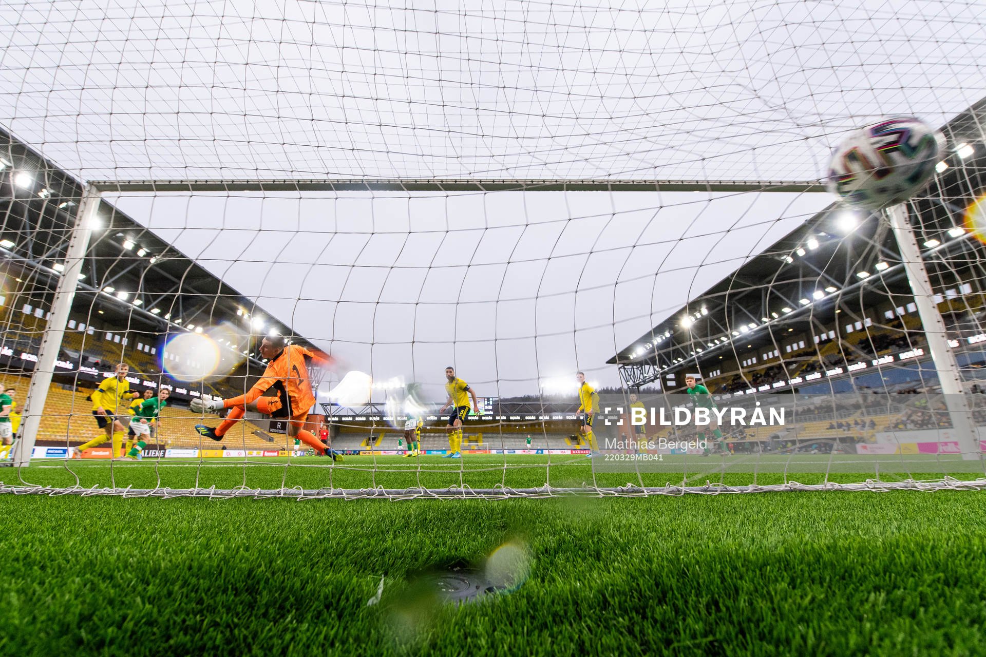 Ross Tierney of Ireland scores 0-1 behind goalkeeper Samuel