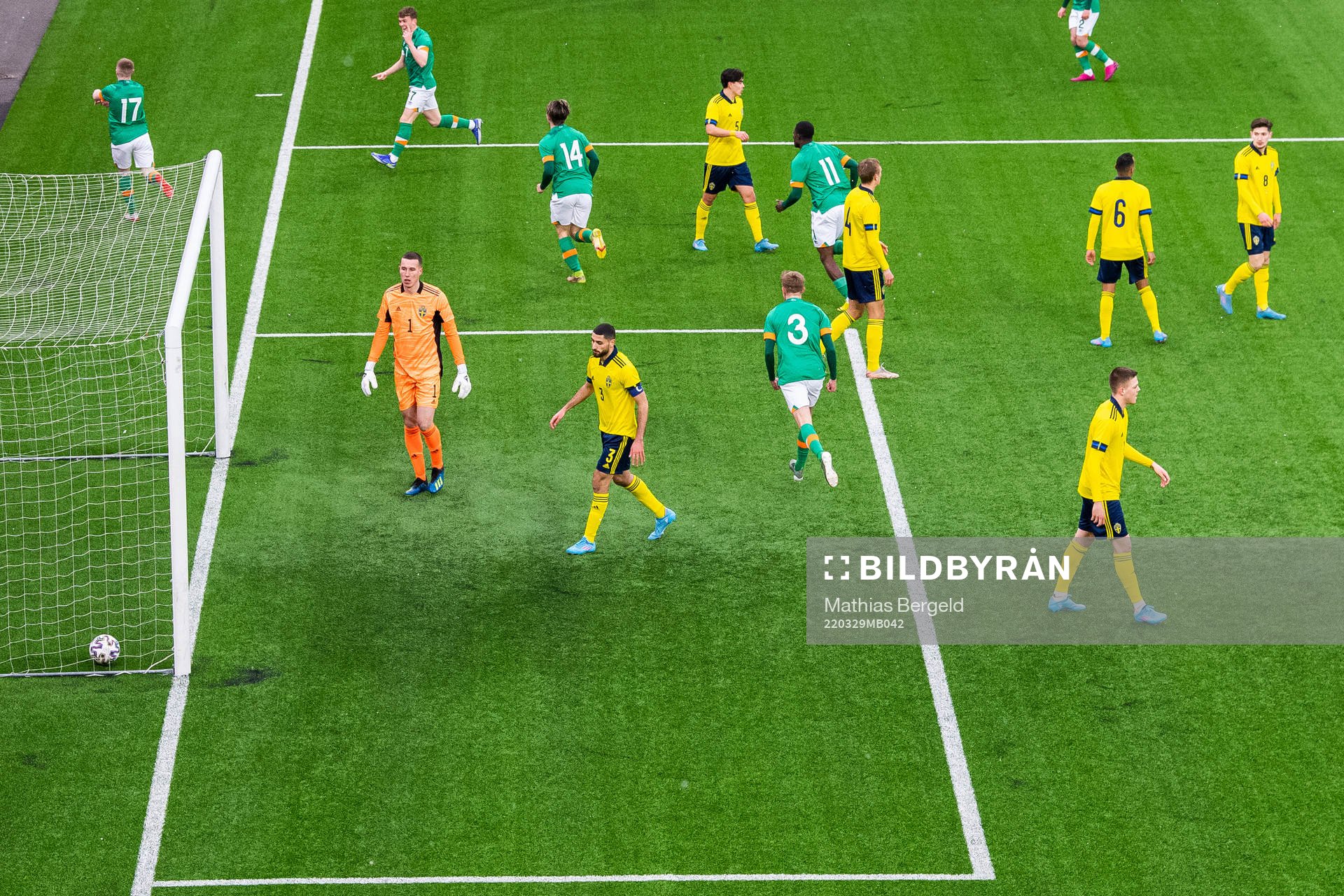 Aiham Ousou and goalkeeper Samuel Brolin of Sweden look