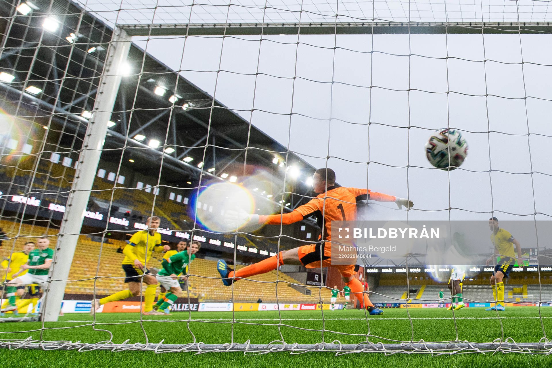 Ross Tierney of Ireland scores 0-1 behind goalkeeper Samuel