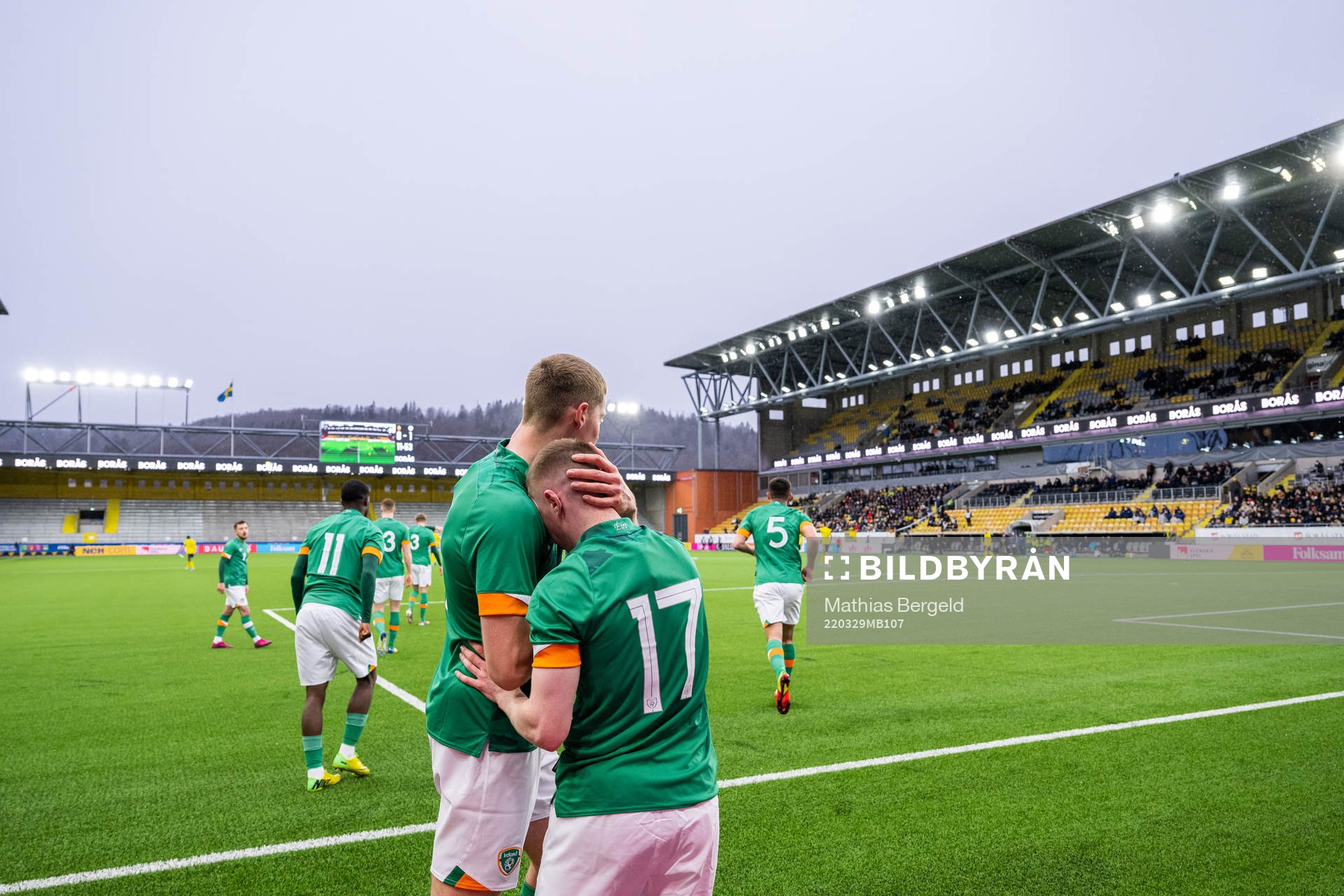 Mark McGuinness celebrates with Ross Tierney of Ireland who