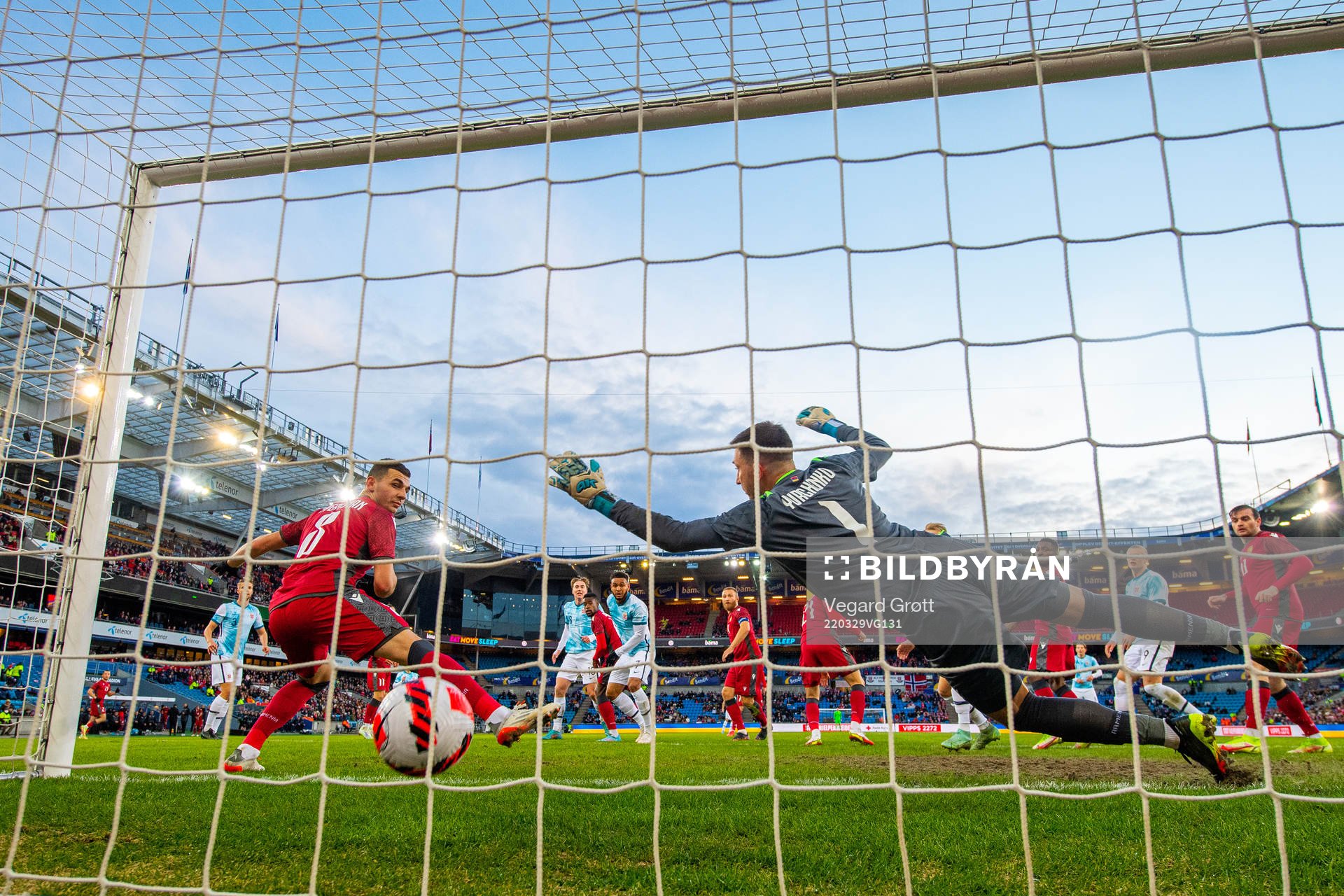 Joshua King of Norway scores the 3-0 goal behind goalkeeper