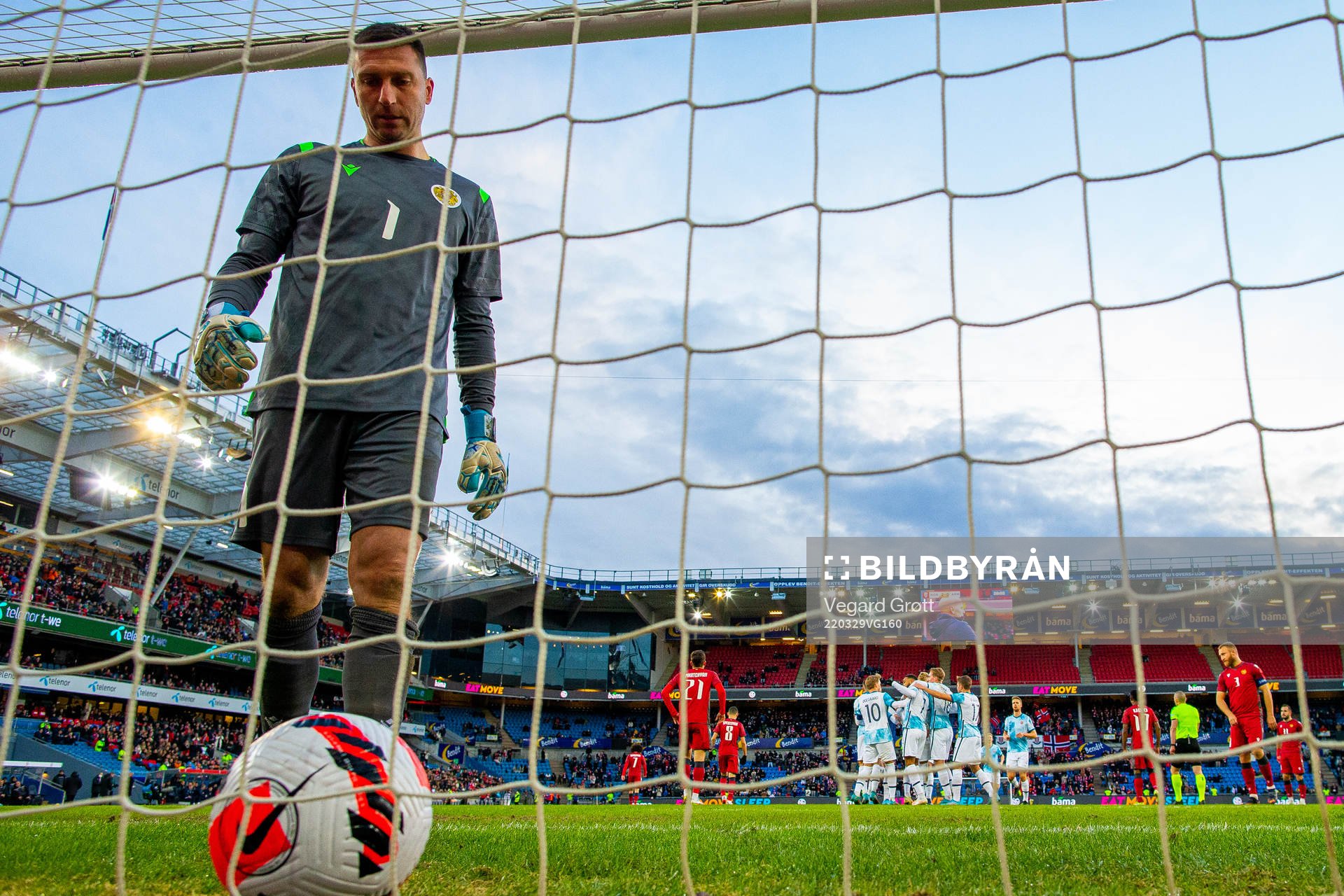 Goalkeeper David Yurchenko of Armenia looks dejected