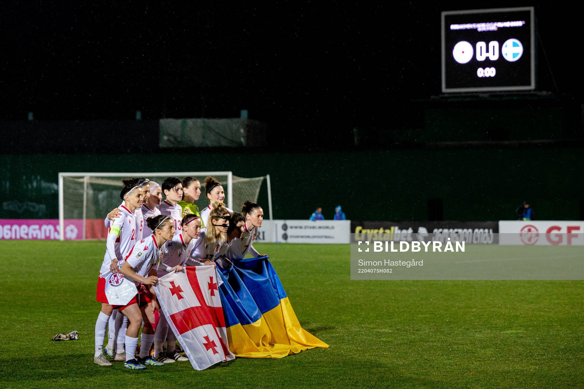 Players of Georgia with the flags of Georgia and Ukraine