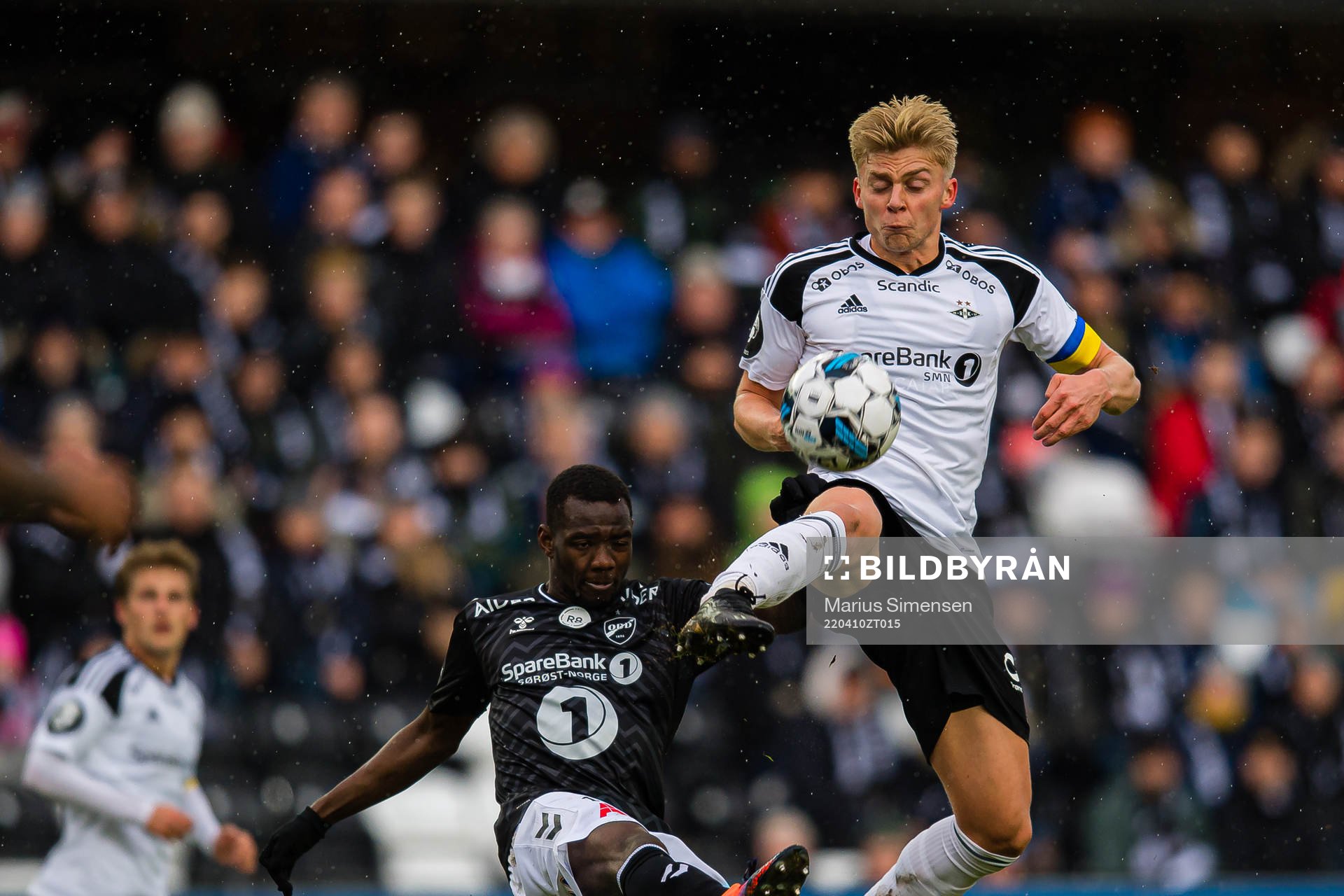 Joshua Gaston Kitolano of Odd and Tobias Borchgrevink Børkeeiet of Rosenborg during the Eliteserien match between Rosenborg and Odd on April 10, 2022 in Trondheim.
