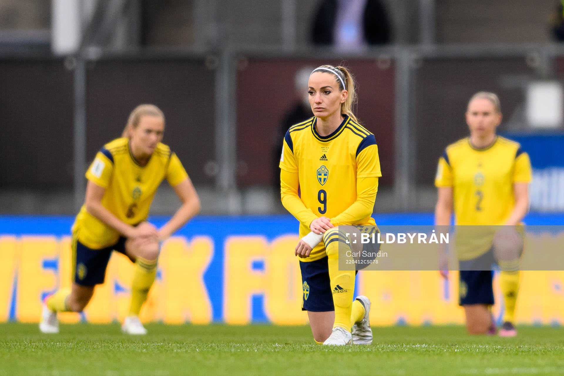 Kosovare Asllani of Sweden takes a knee in support of the