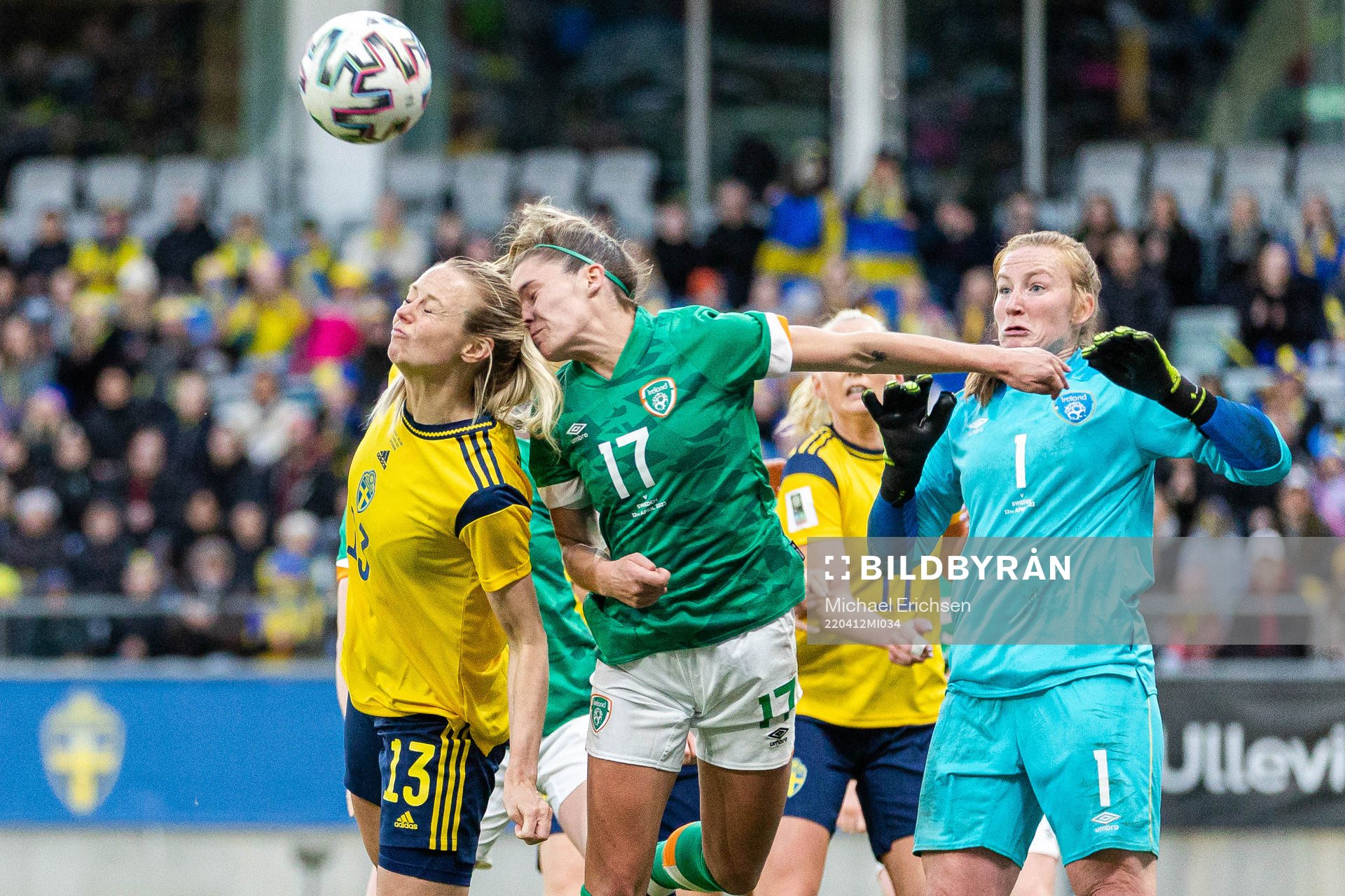 Amanda Ilestedt of Sweden against Jamie Finn and goalkeeper