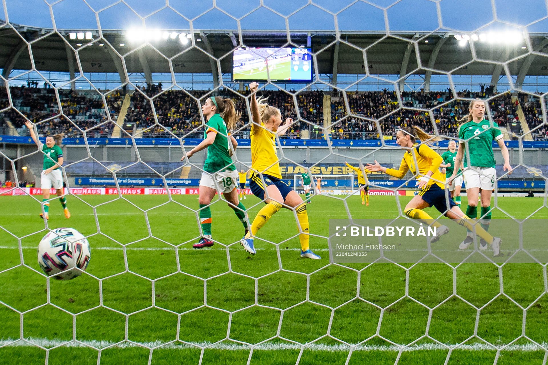 Kosovare Asllani of Sweden celebrates scoring 1-1