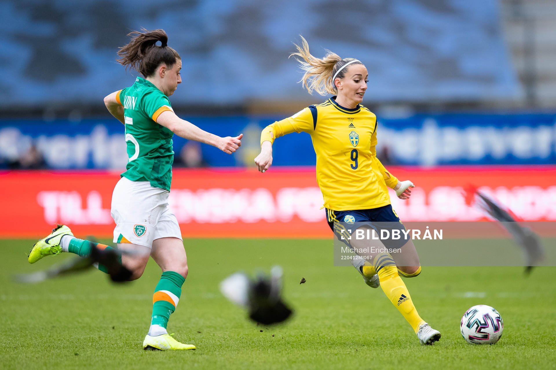 Lucy Quinn of Ireland and Kosovare Asllani of Sweden