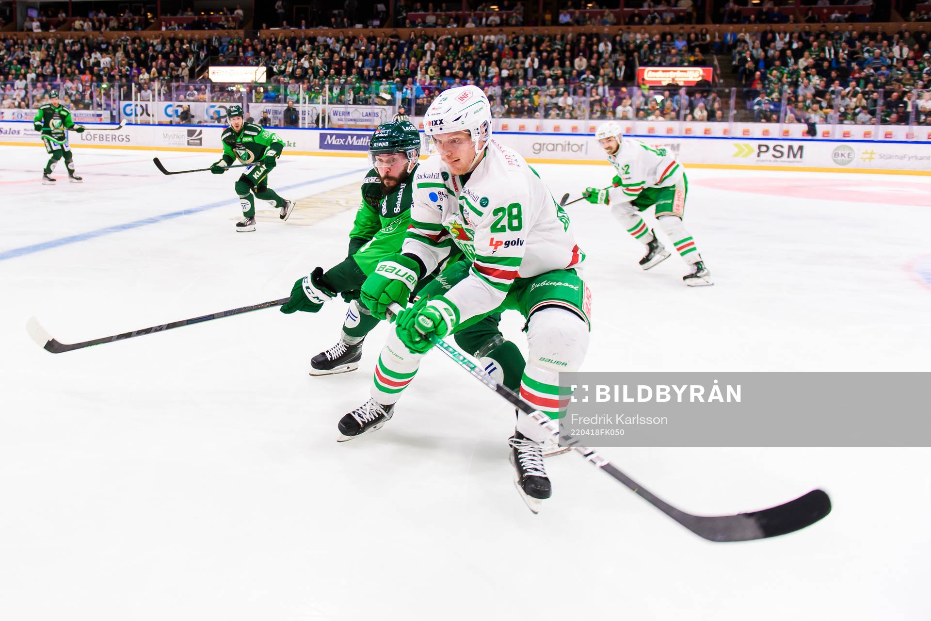 Färjestads Jesse Virtanen och Rögles Anton Bengtsson