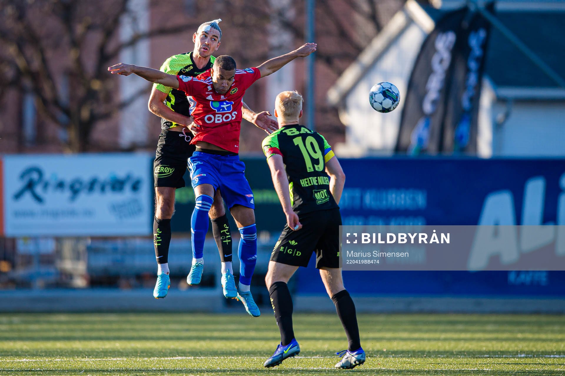 Fredrik Pallesen Knudsen of Brann and Johnny Buduson of