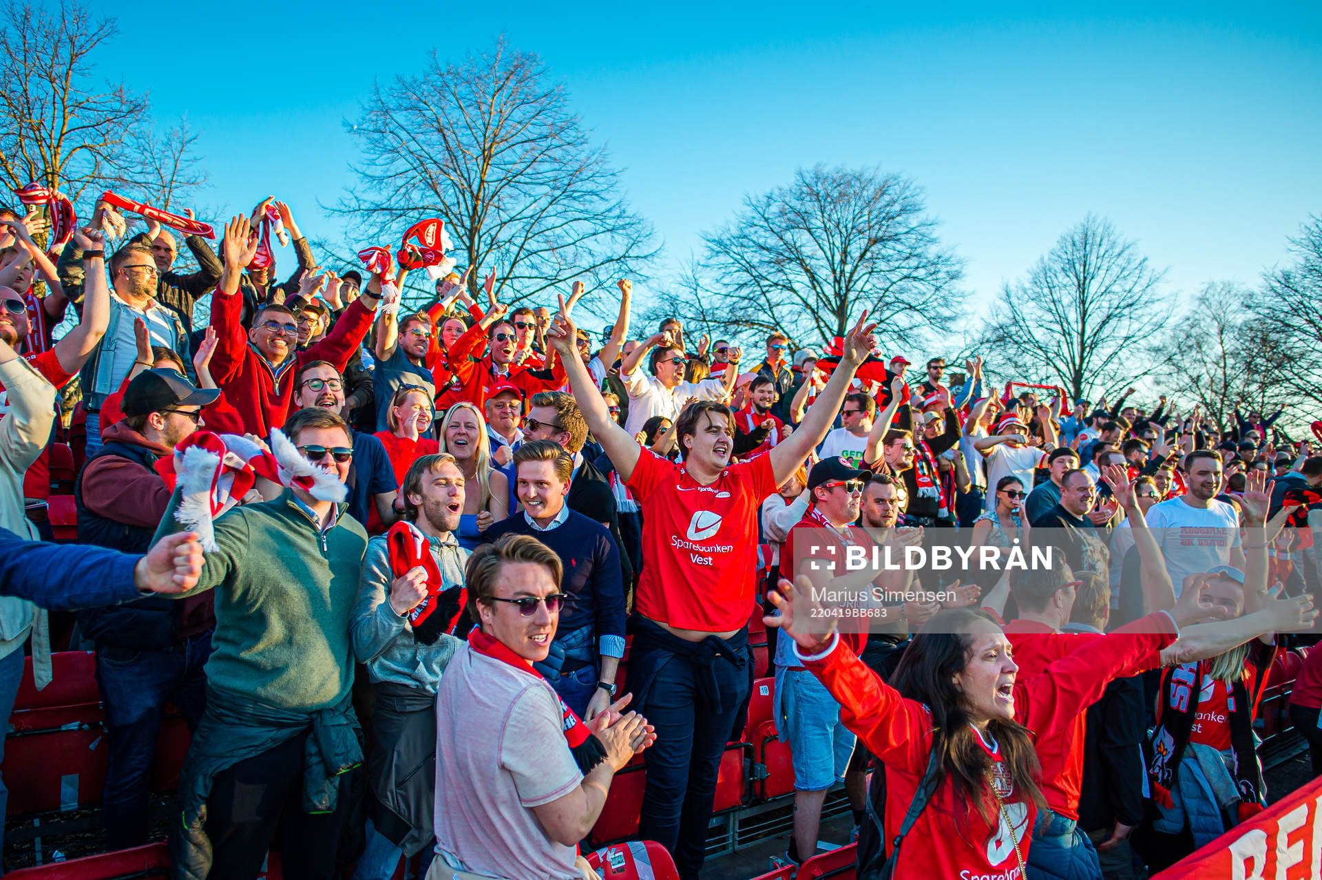 Spectators in the stands celebrates