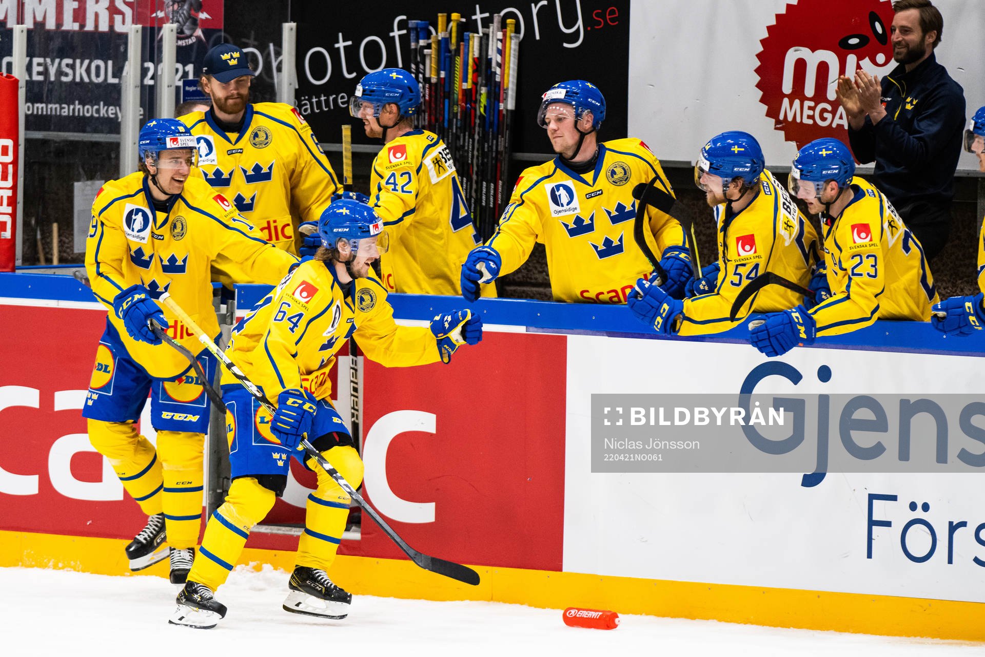Mathias Bromé of Sweden celebrates with team mates