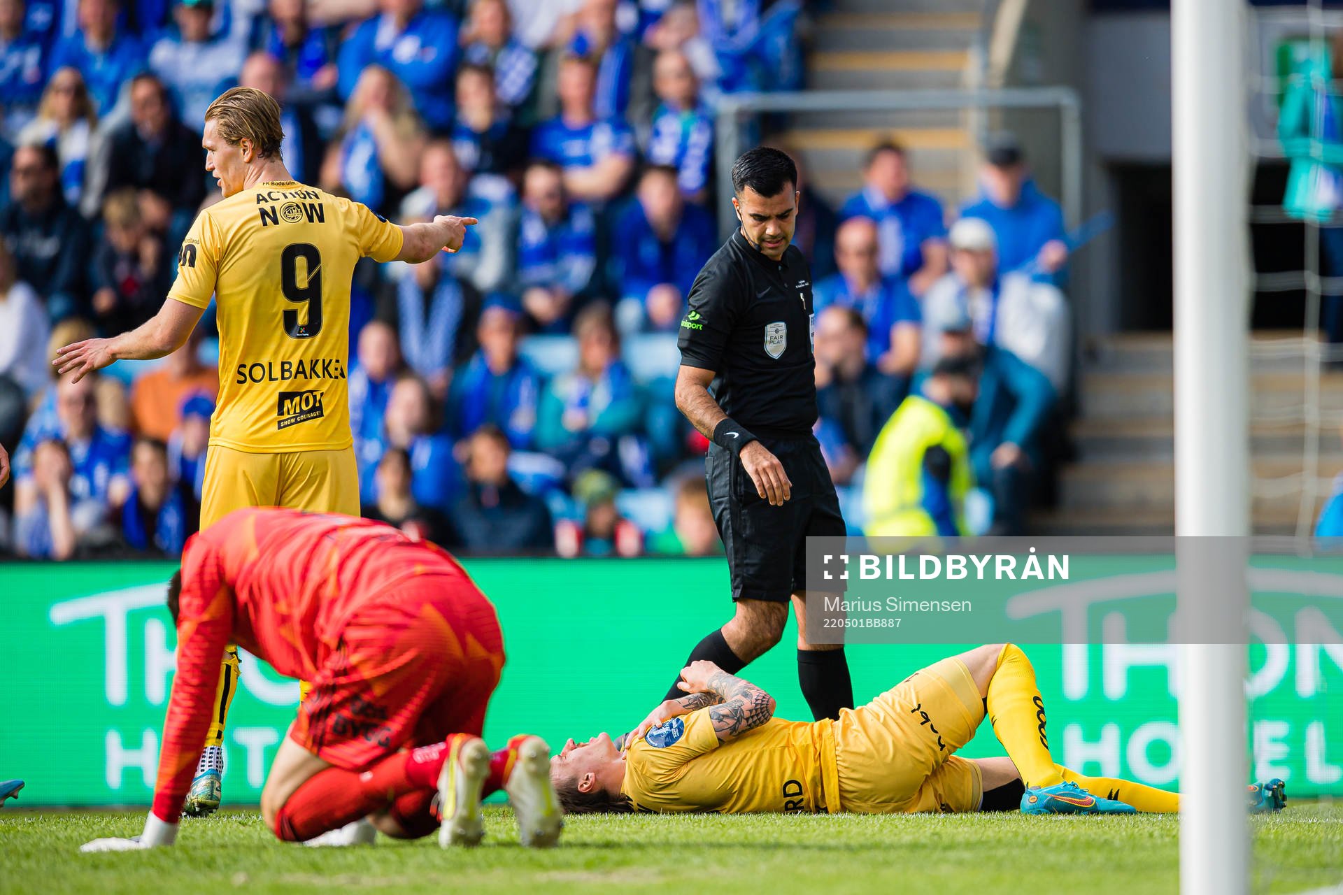 Rohit Saggi, referee, and Runar Espejord of Bodø/Glimt in