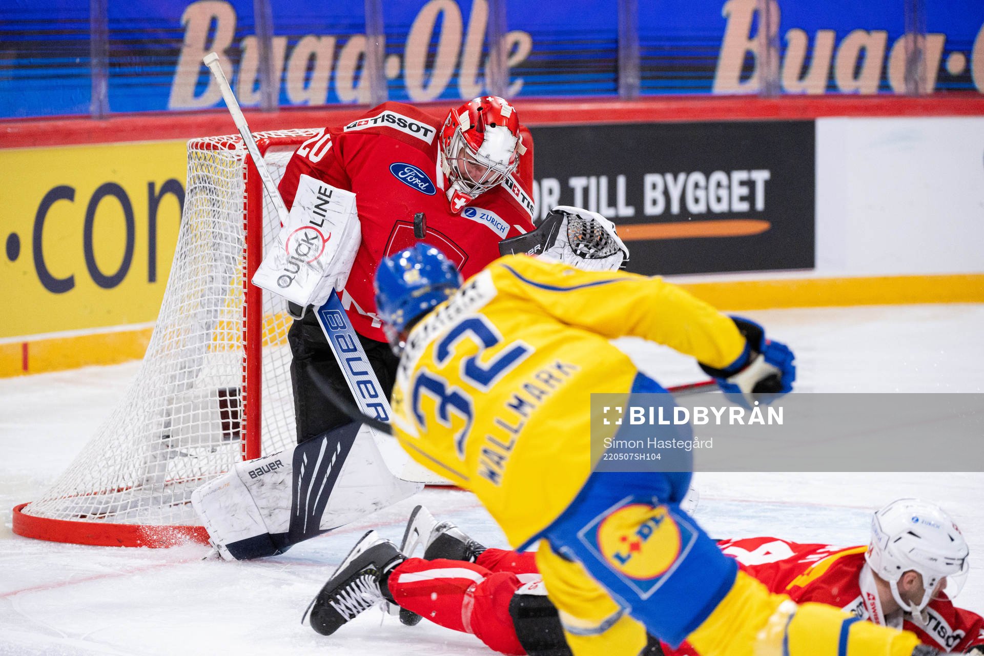 Lucas Wallmark of Sweden against Goalkeeper Reto Berra of
