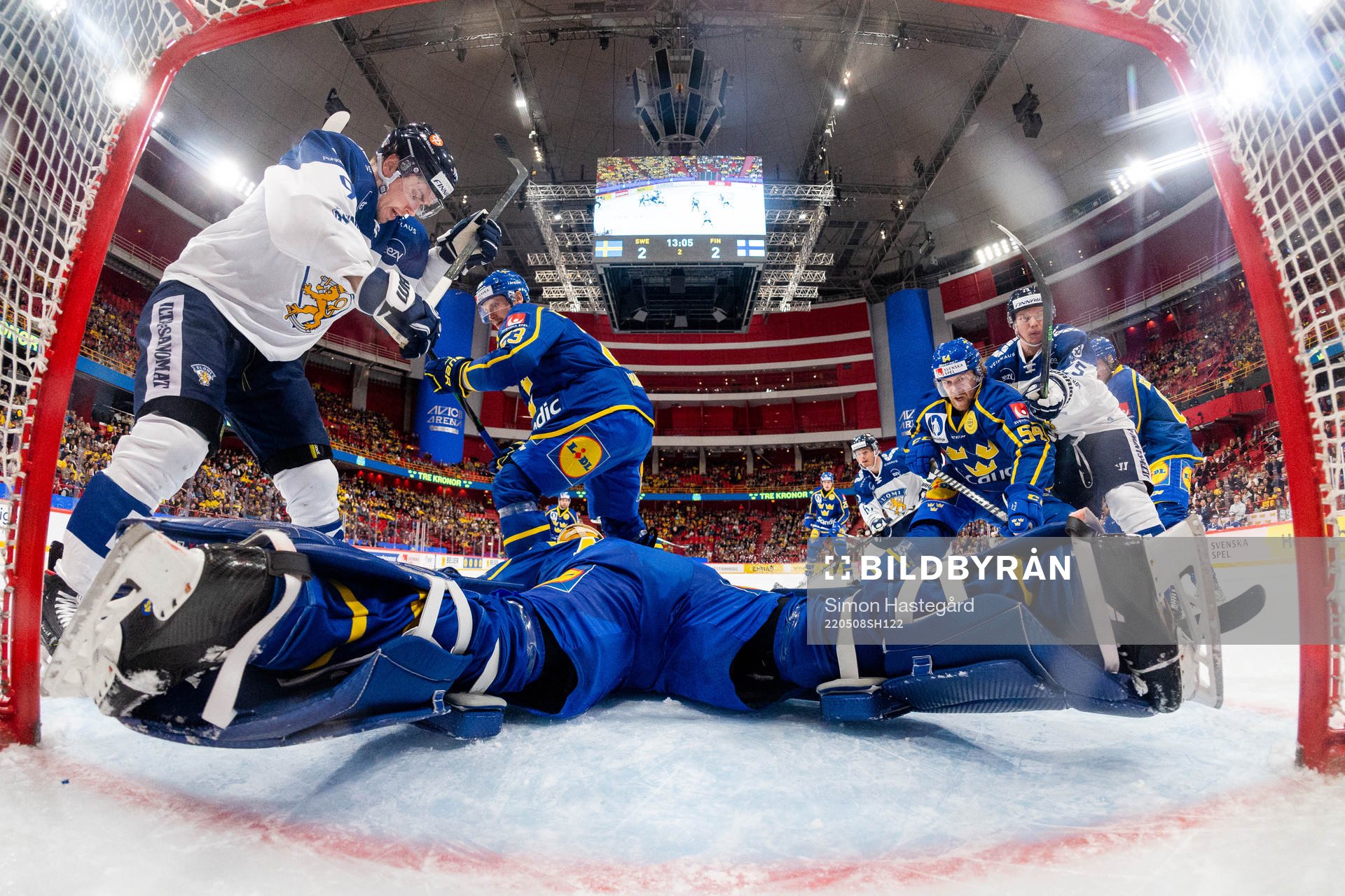 Oliver Ekman-Larsson, goalkeeper Magnus Hellberg and Anton