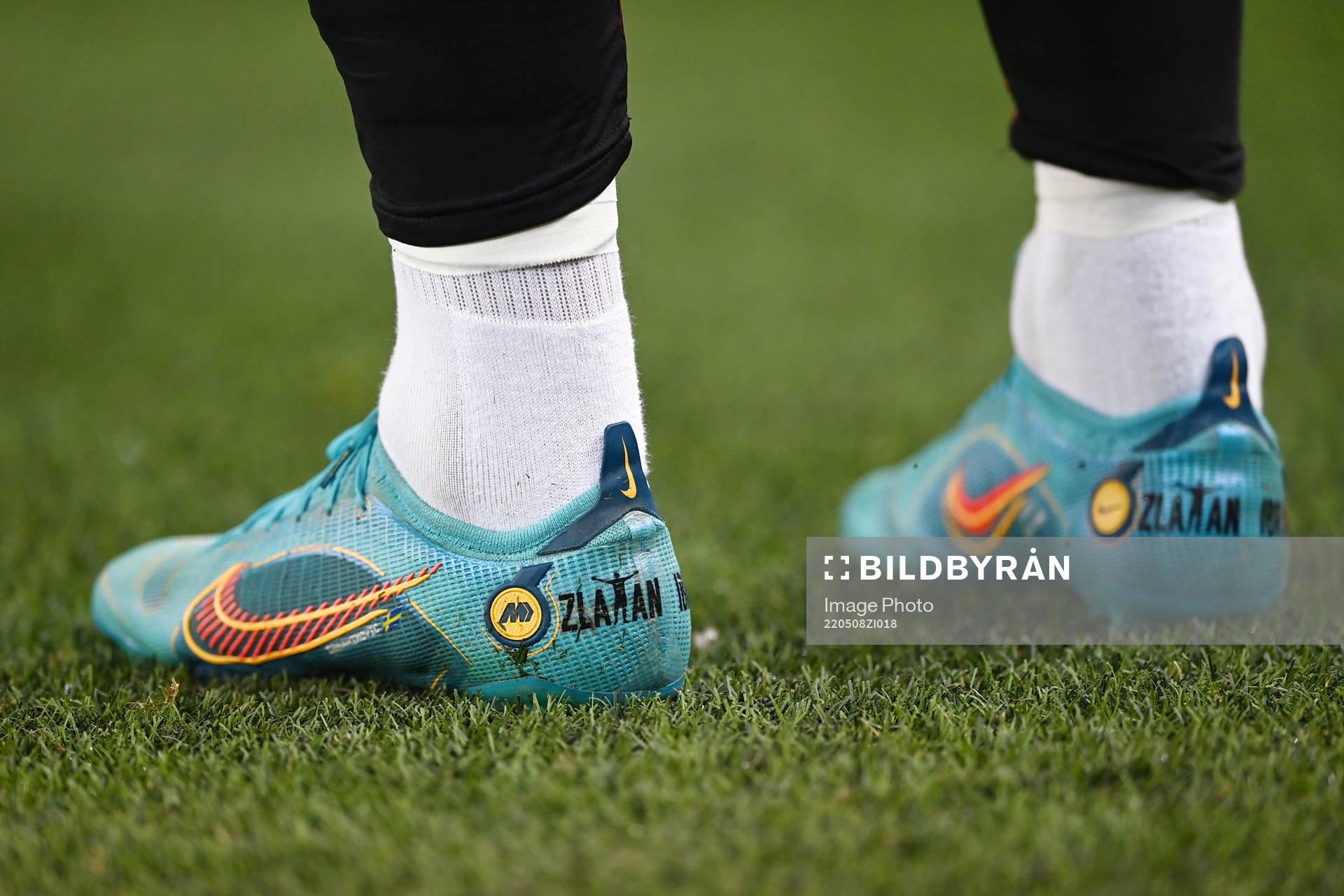 A pair of football shoes with the text Zlatan
