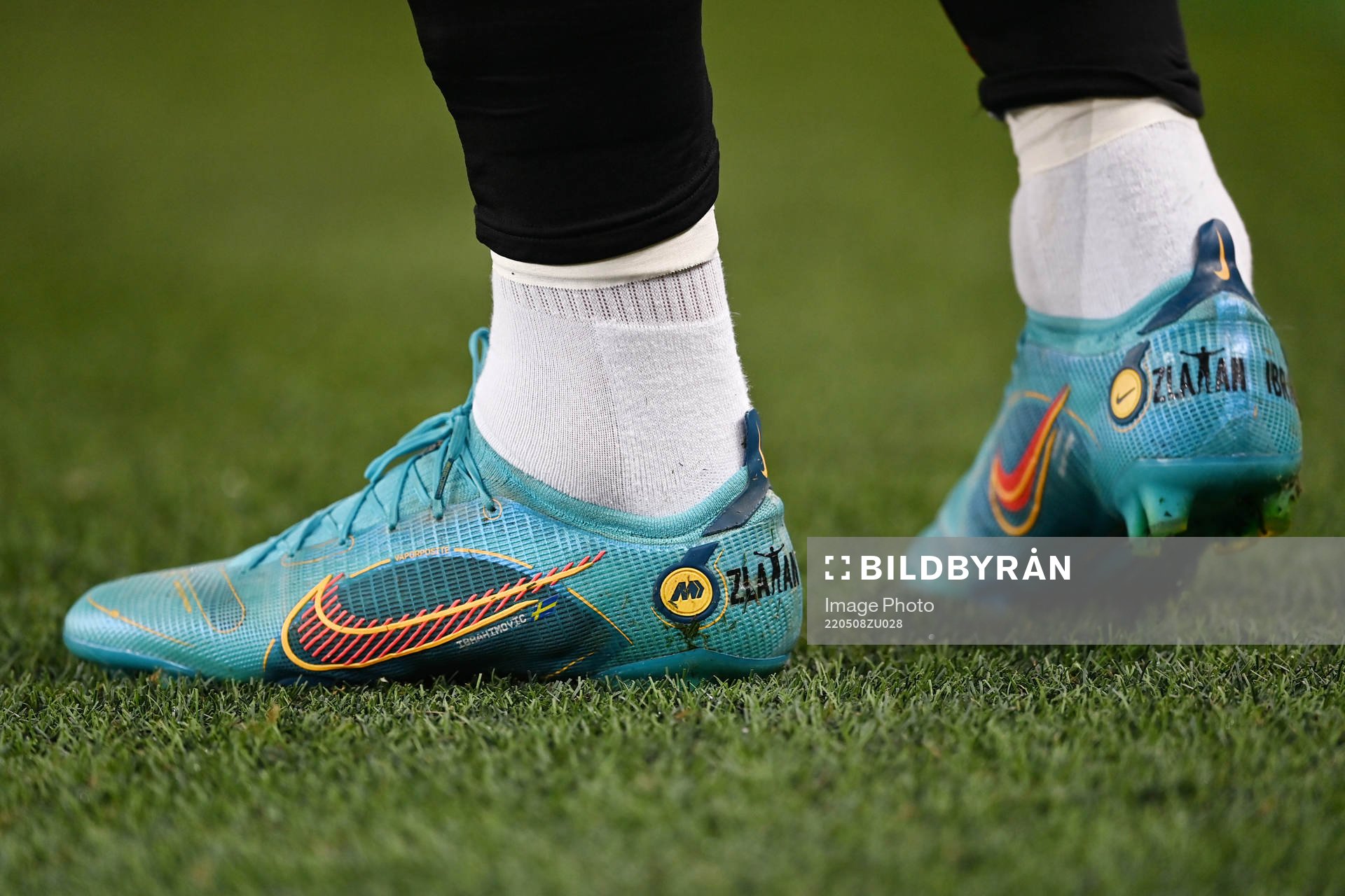 A pair of football shoes with the text Zlatan