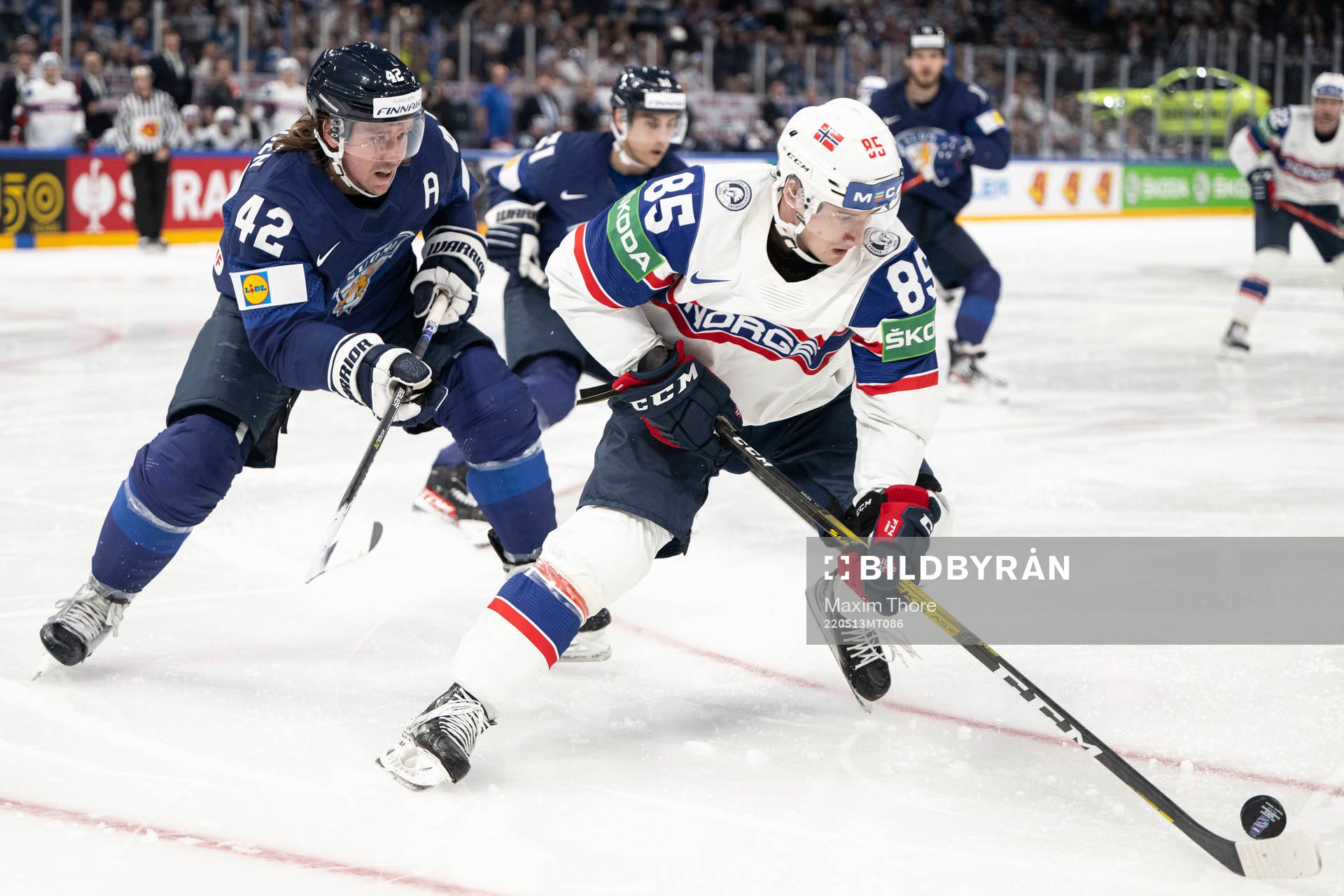 Sami Vatanen of Finland and Michael Haga of Norway