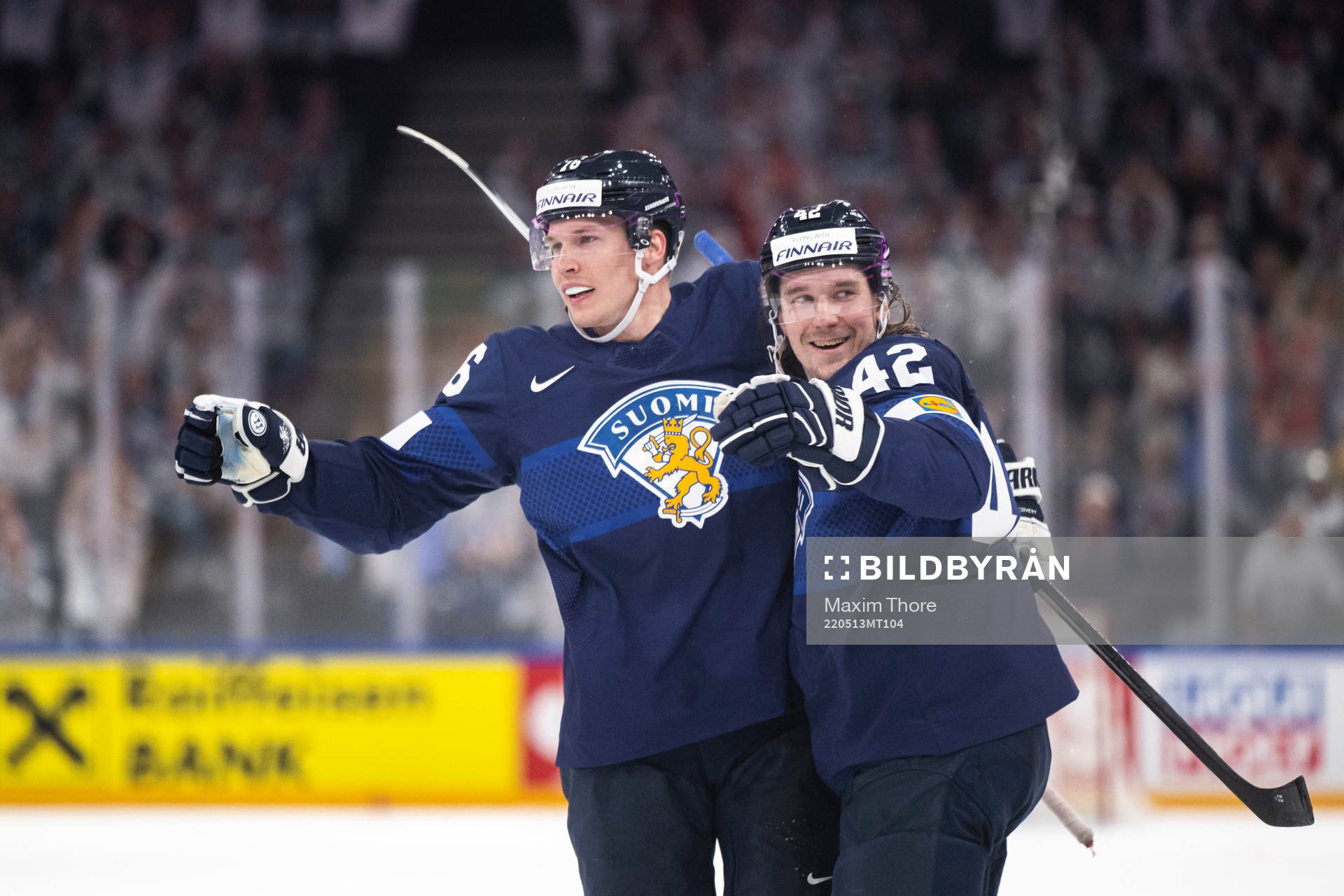 Jere Sallinen and Sami Vatanen of Finland celebrate the 5-0