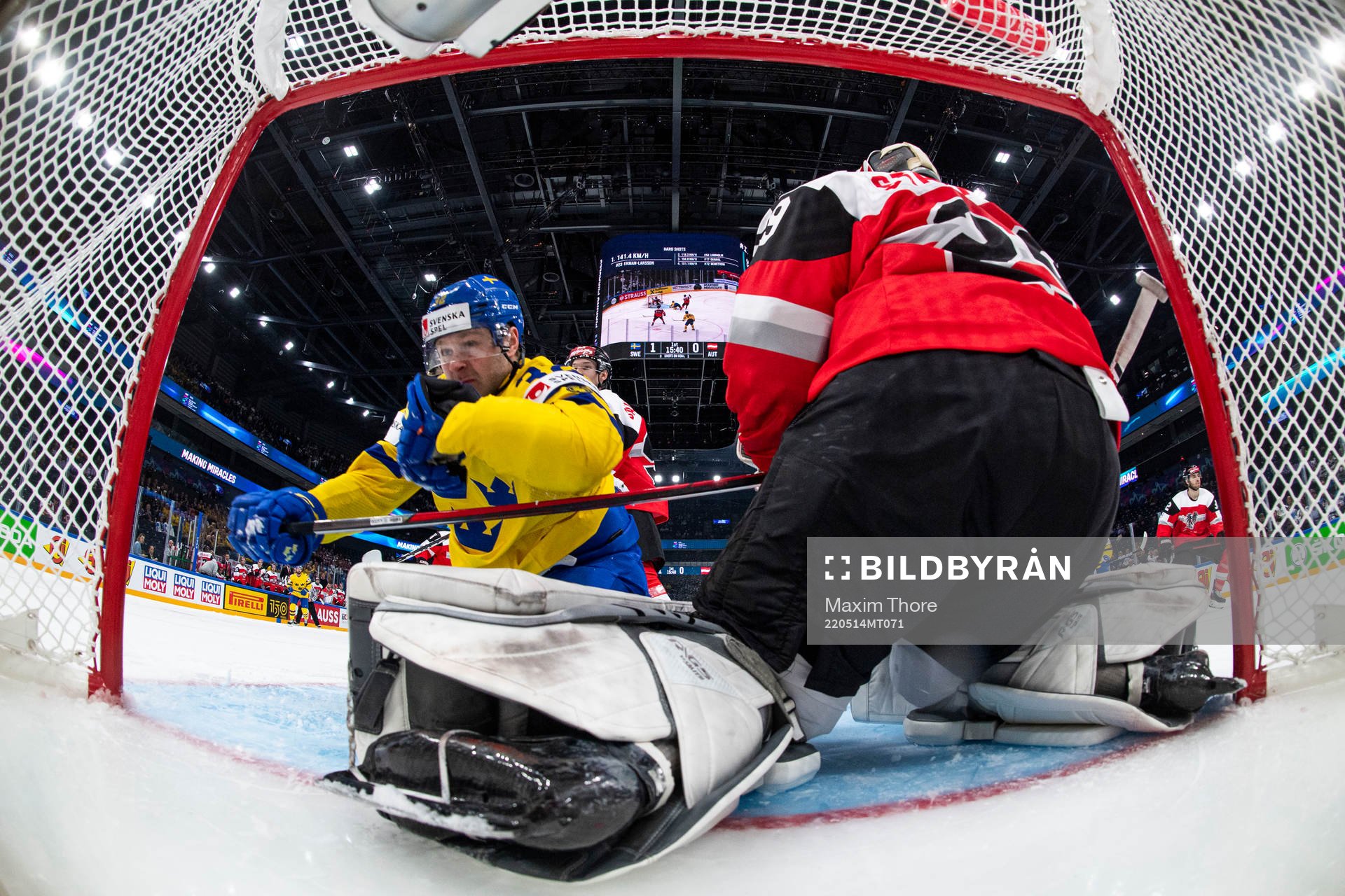 Lucas Wallmark of Sweden and goaltender Bernhard Starkbaum