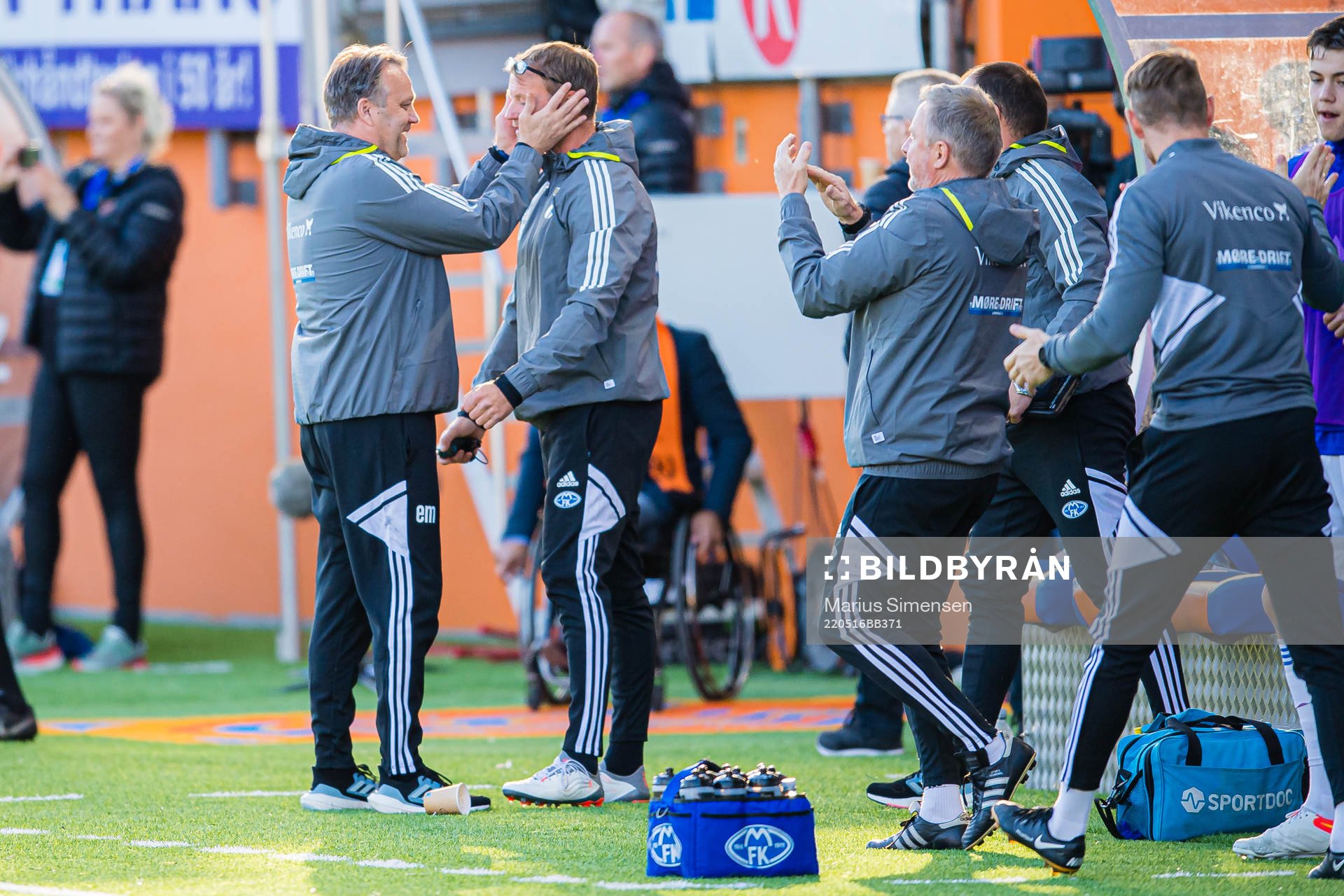 Erling Moe, head coach of Molde, and Trond Strande, assistant coach of Molde, celebrates after the Eliteserien match between Aalesund and Molde on May 16, 2022 in Ålesund.