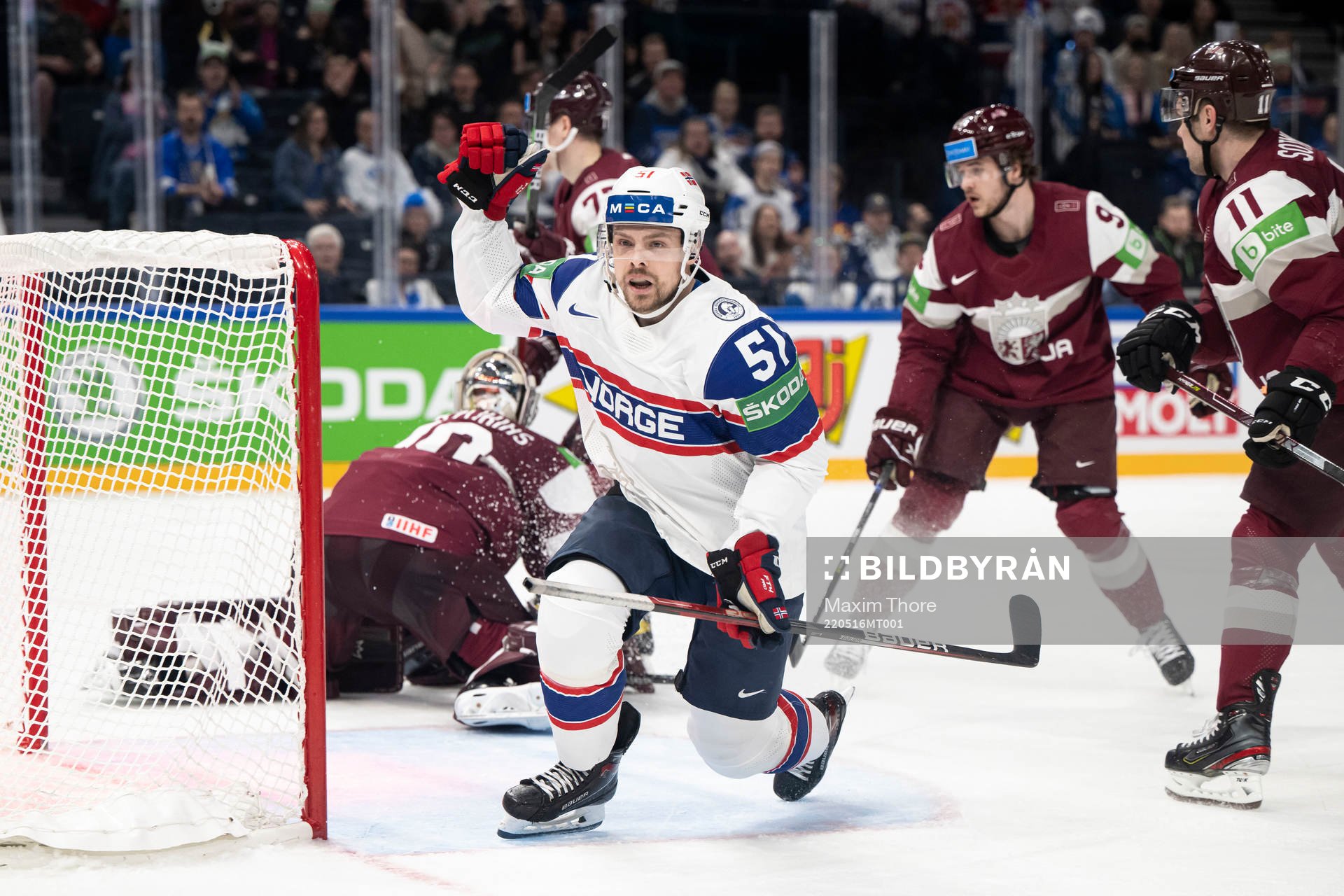 Mats Rosseli Olsen of Norway celebrates