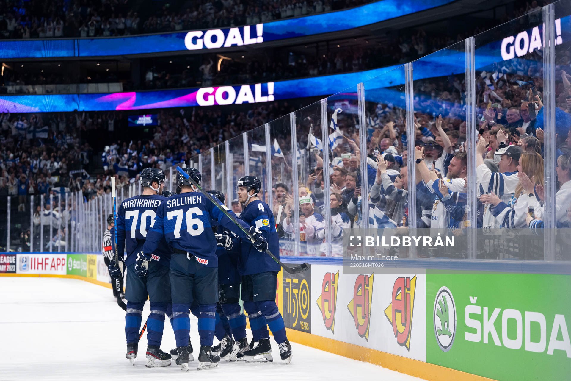 Mikael Granlund of Finland celebrate with teammates
