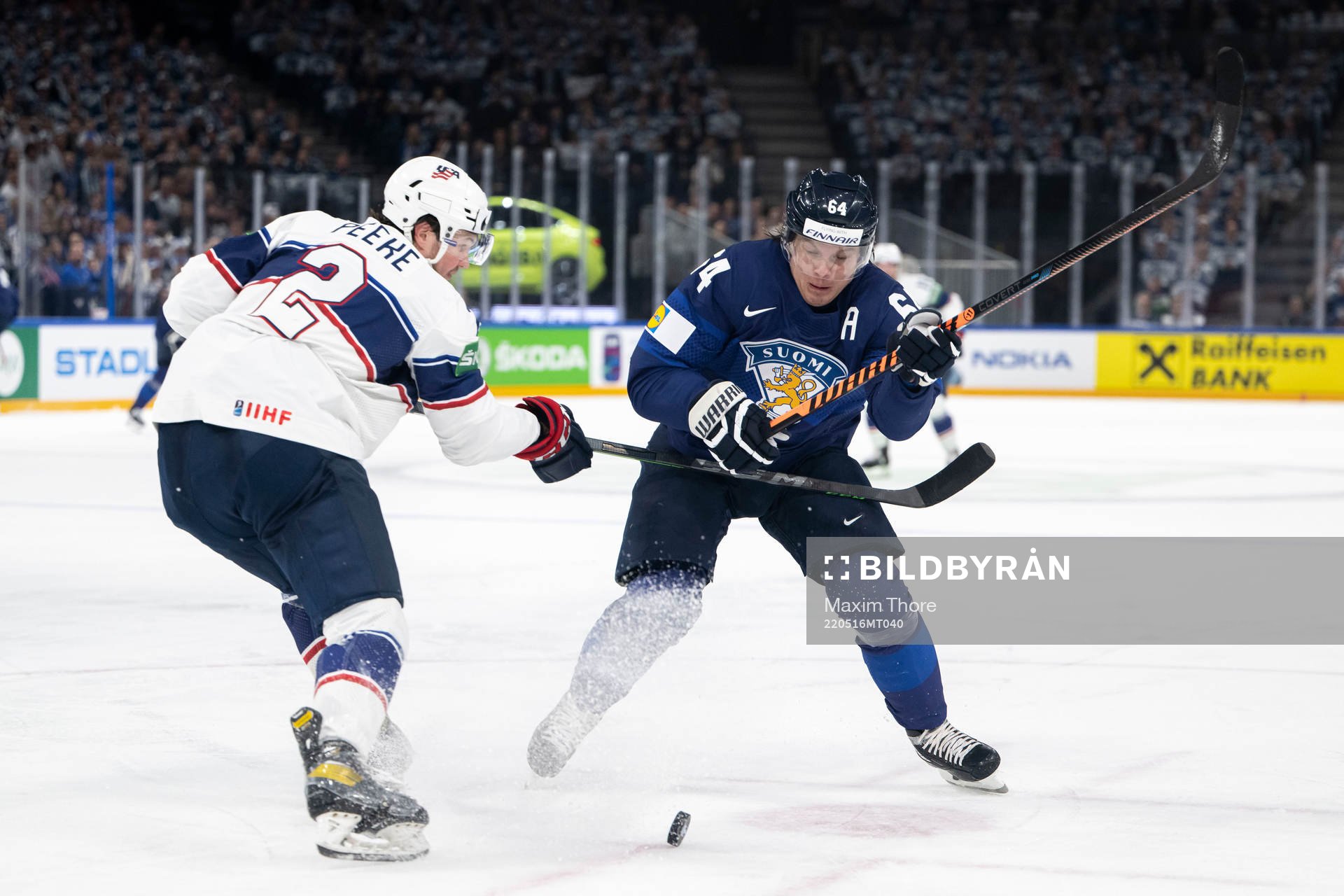 Andrew Peeke of USA and Mikael Granlund of Finland