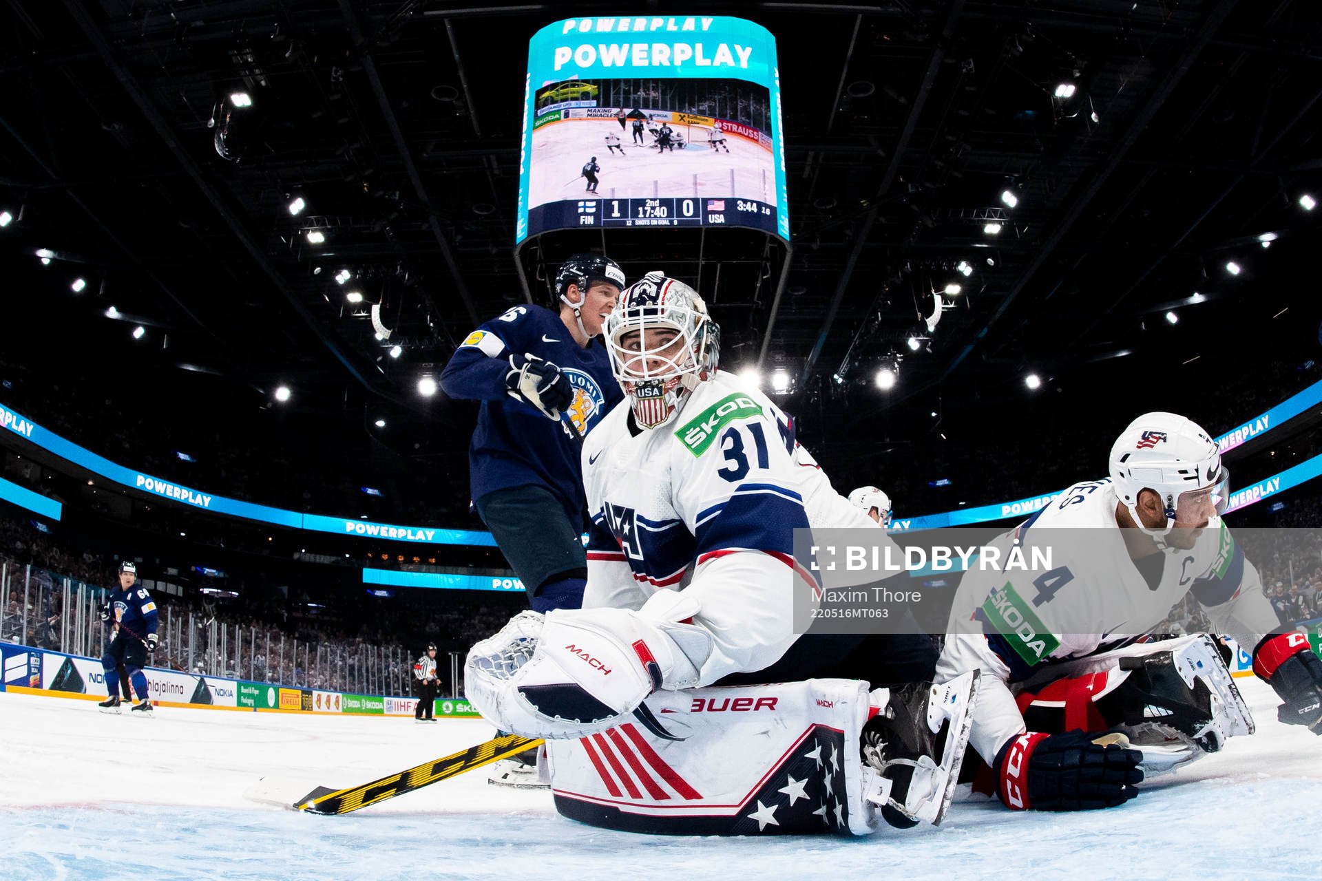 Goaltender Strauss Mann and Seth Jones of USA
