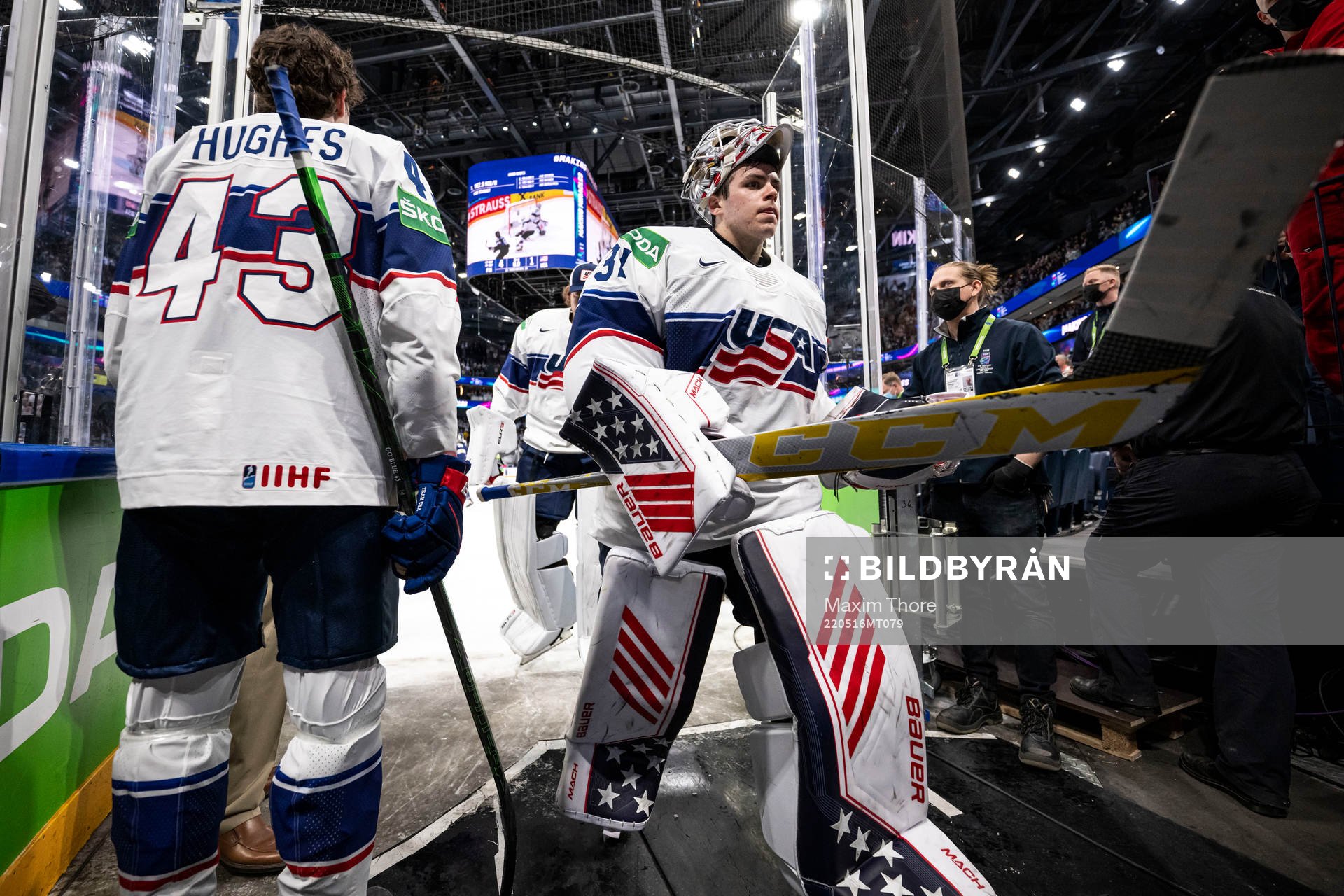 Goaltender Strauss Mann of USA looks dejected