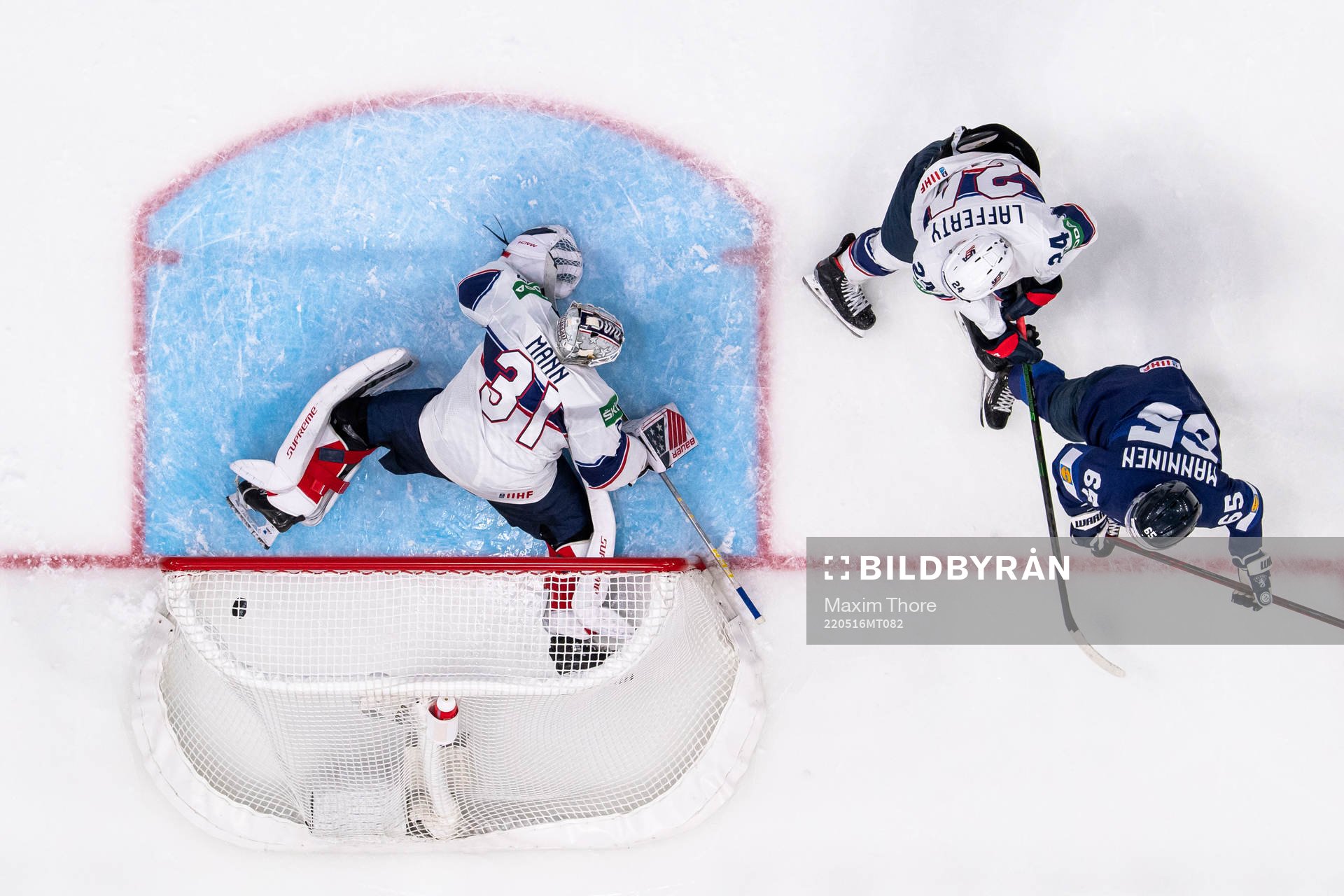 Saku Mäenalanen of Finland scores the 3-0 goal behind