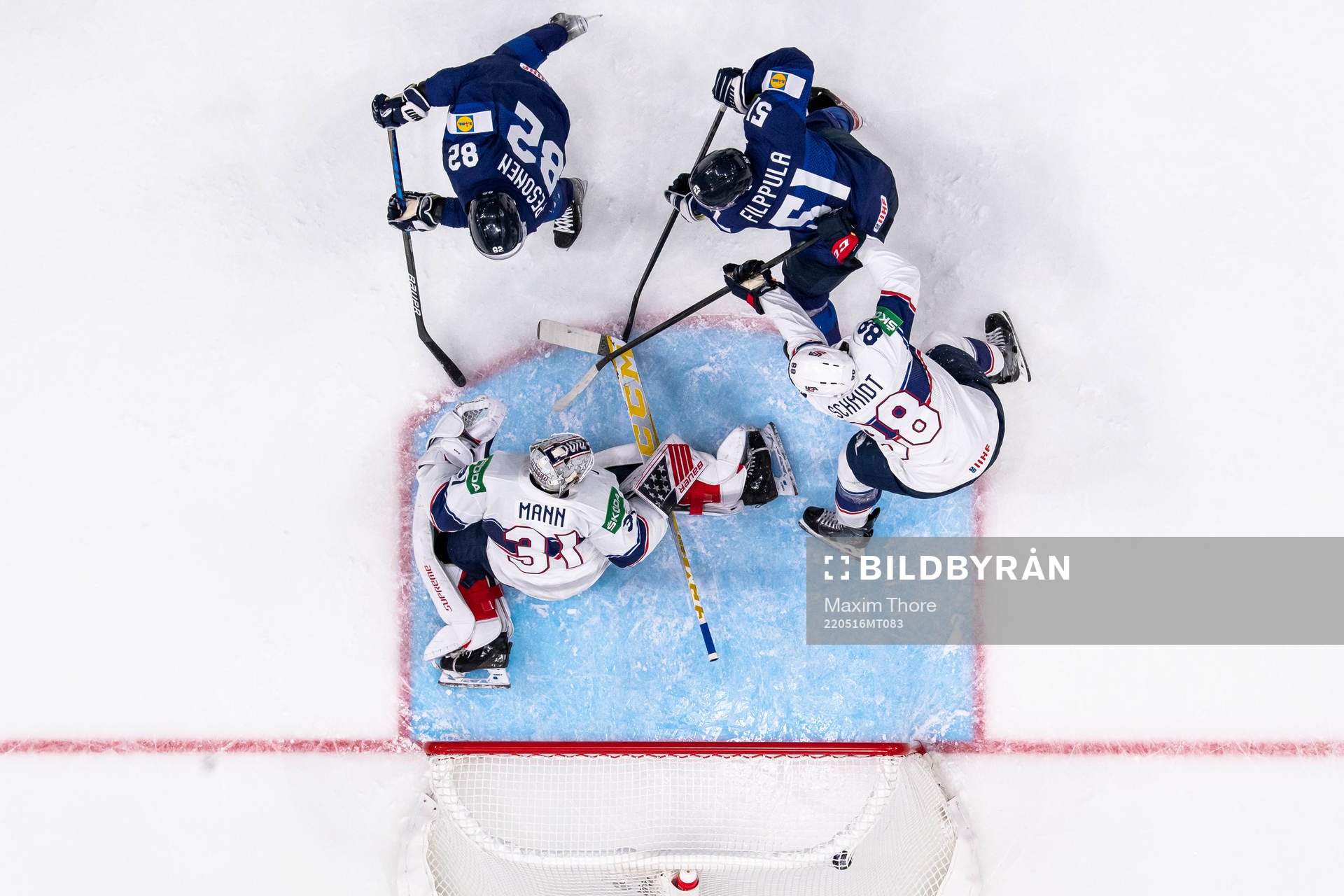 Harri Pesonen and Valtteri Filppula of Finland sees Mikko