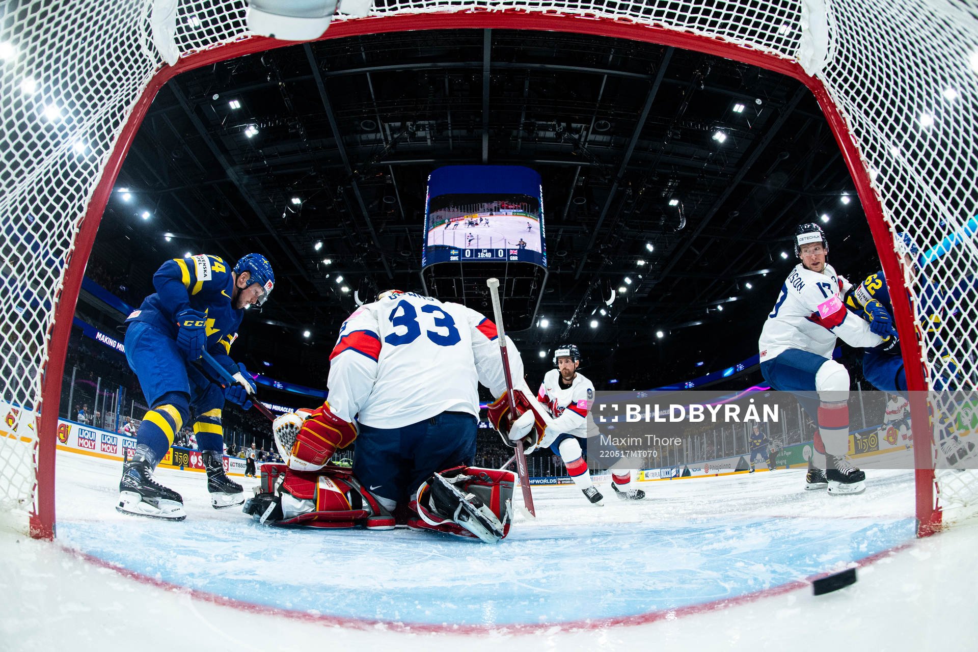 Rasmus Asplund of Sweden scores the 1-0 goal behind