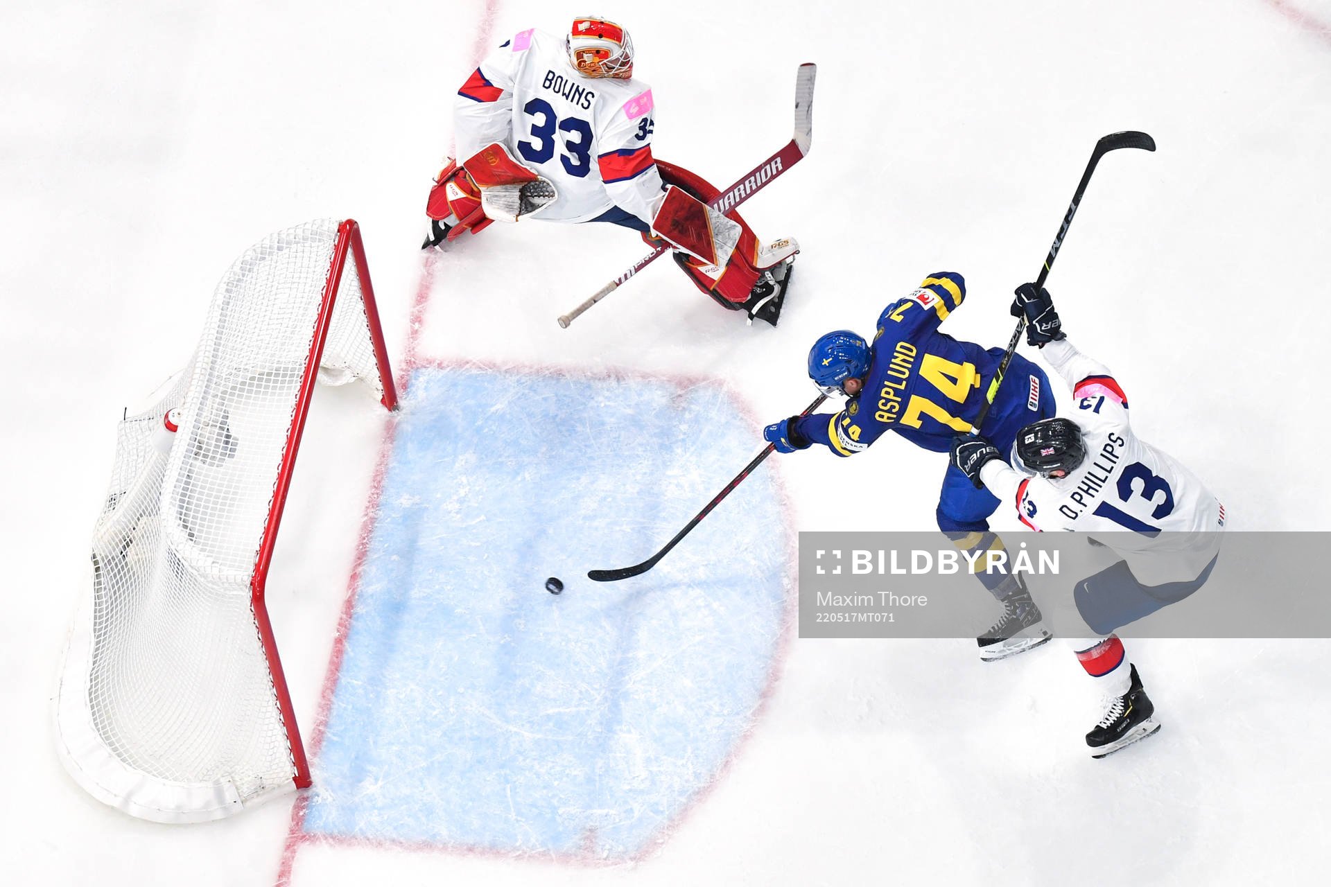 Rasmus Asplund of Sweden scores the 5-0 goal behind